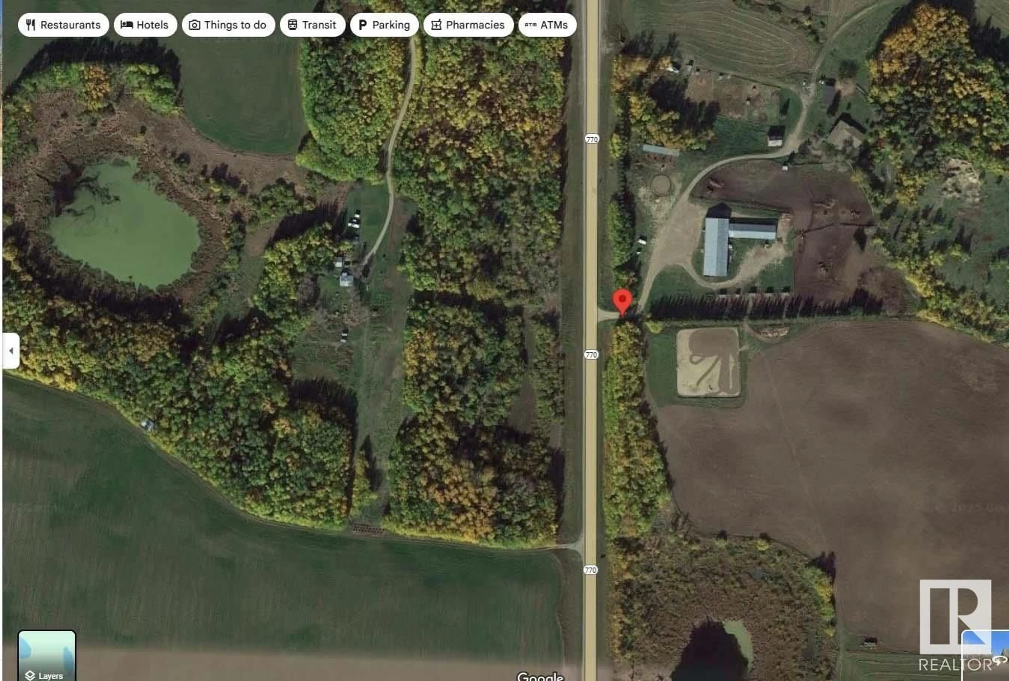 A pic from outside/outdoor area/front of a property/back of a property/a pic from drone, water/lake/river/ocean view for 51531 HIGHWAY 770, Rural Parkland County Alberta T7X1X5