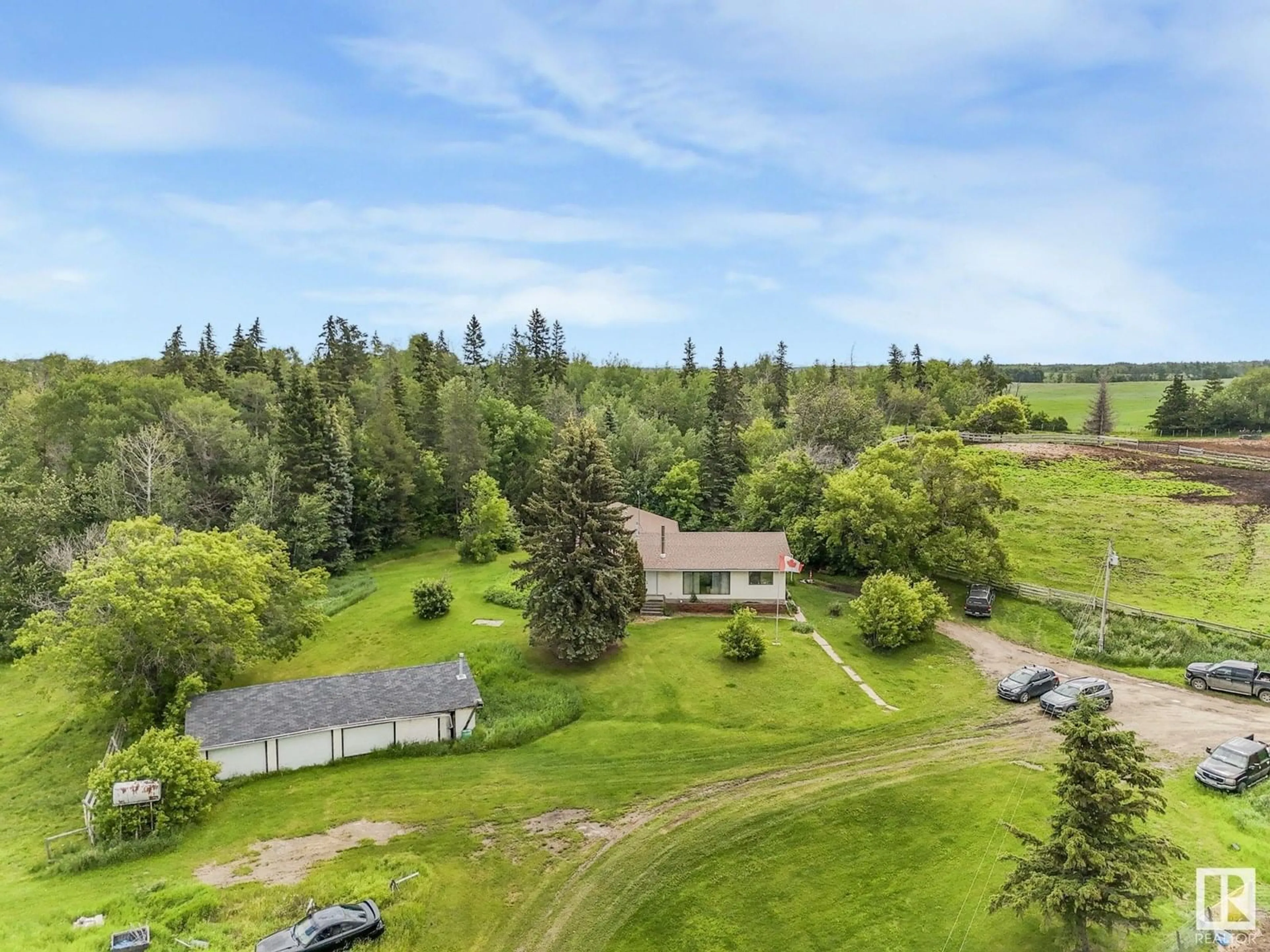 A pic from outside/outdoor area/front of a property/back of a property/a pic from drone, unknown for 51531 HIGHWAY 770, Rural Parkland County Alberta T7X1X5