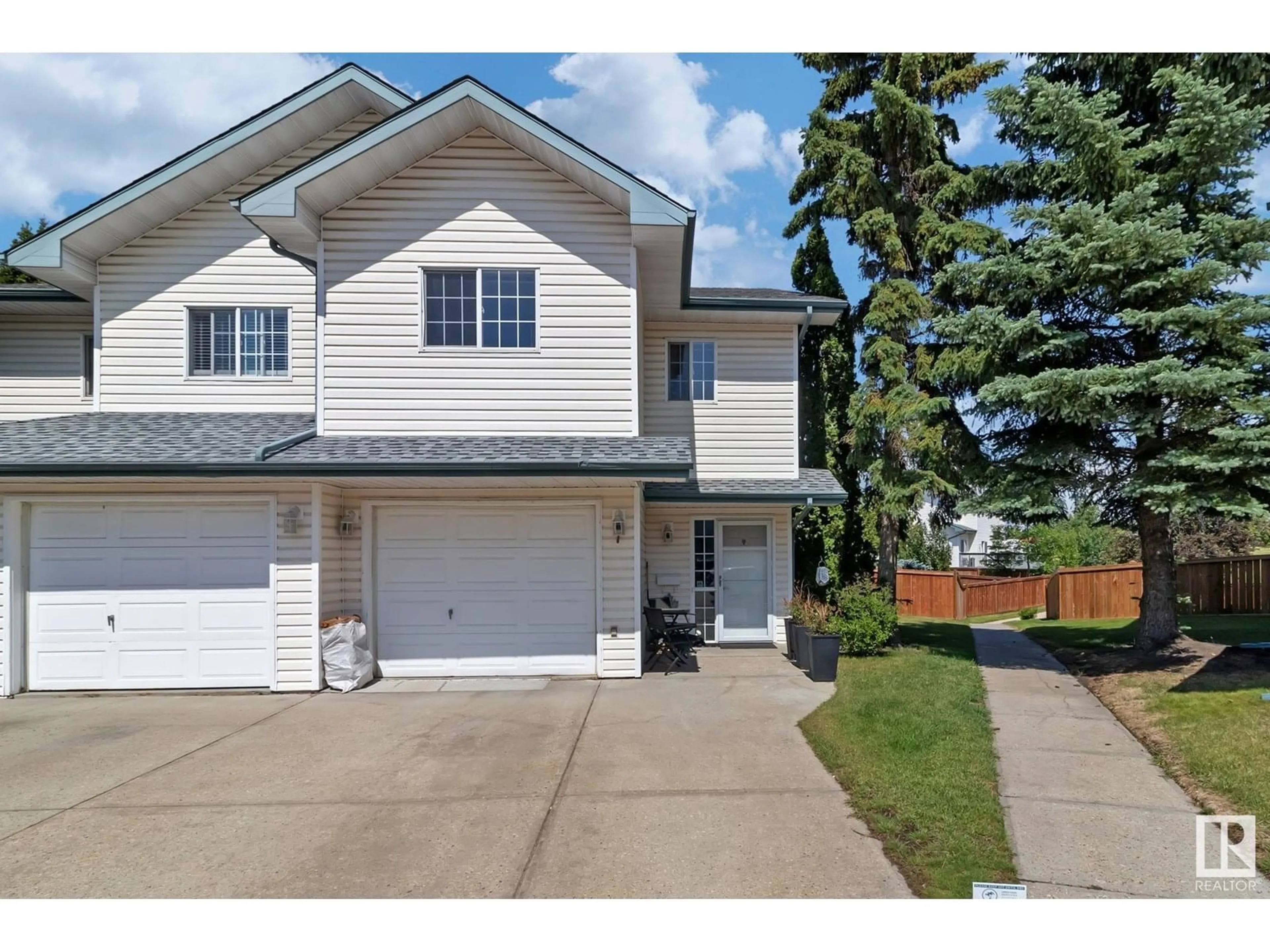Home with vinyl exterior material, street for #7 - 843 YOUVILLE DR, Edmonton Alberta T6L6X8