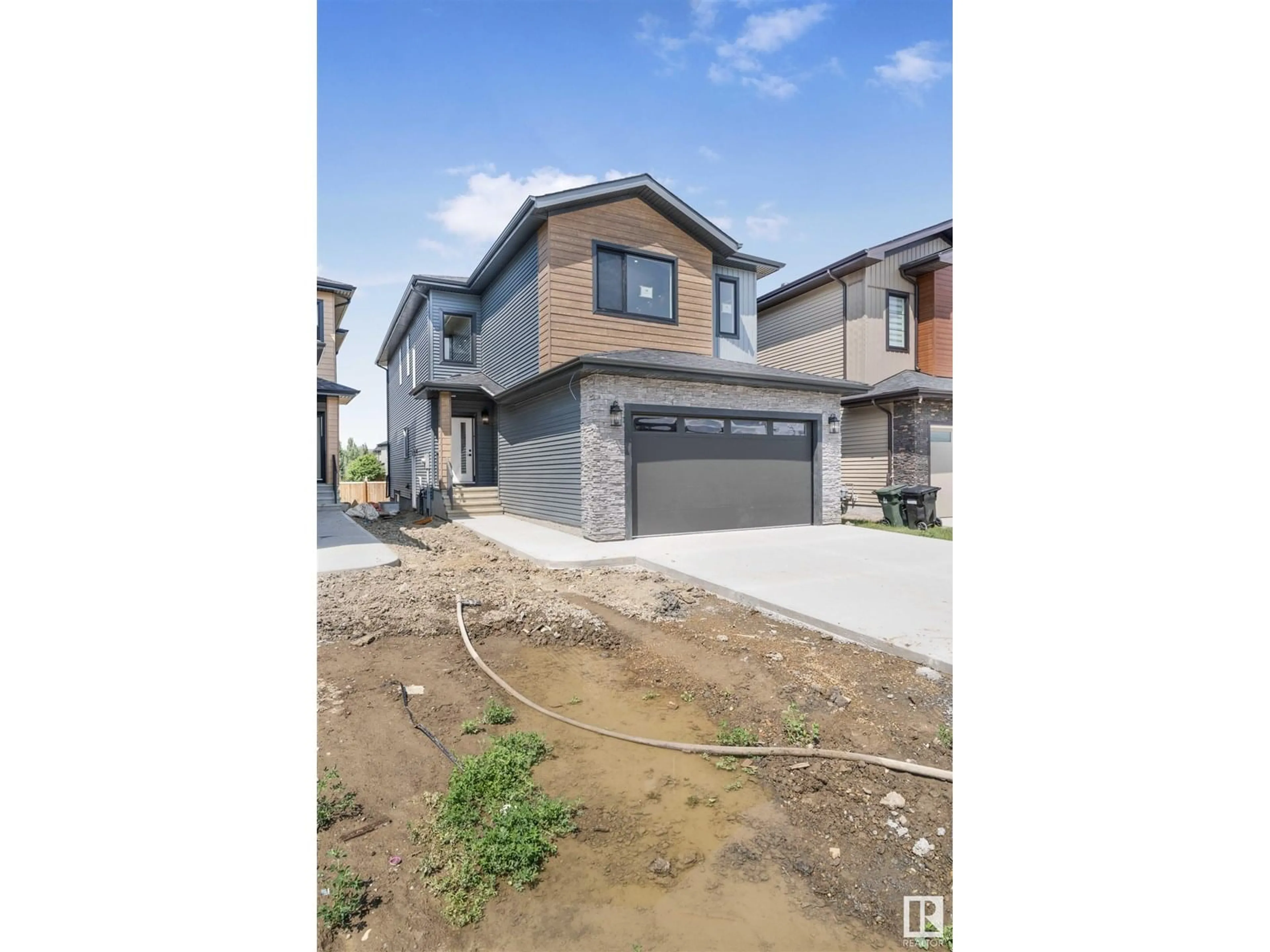 Home with brick exterior material, street for 48 GRASSVIEW CR, Spruce Grove Alberta T7X3G1