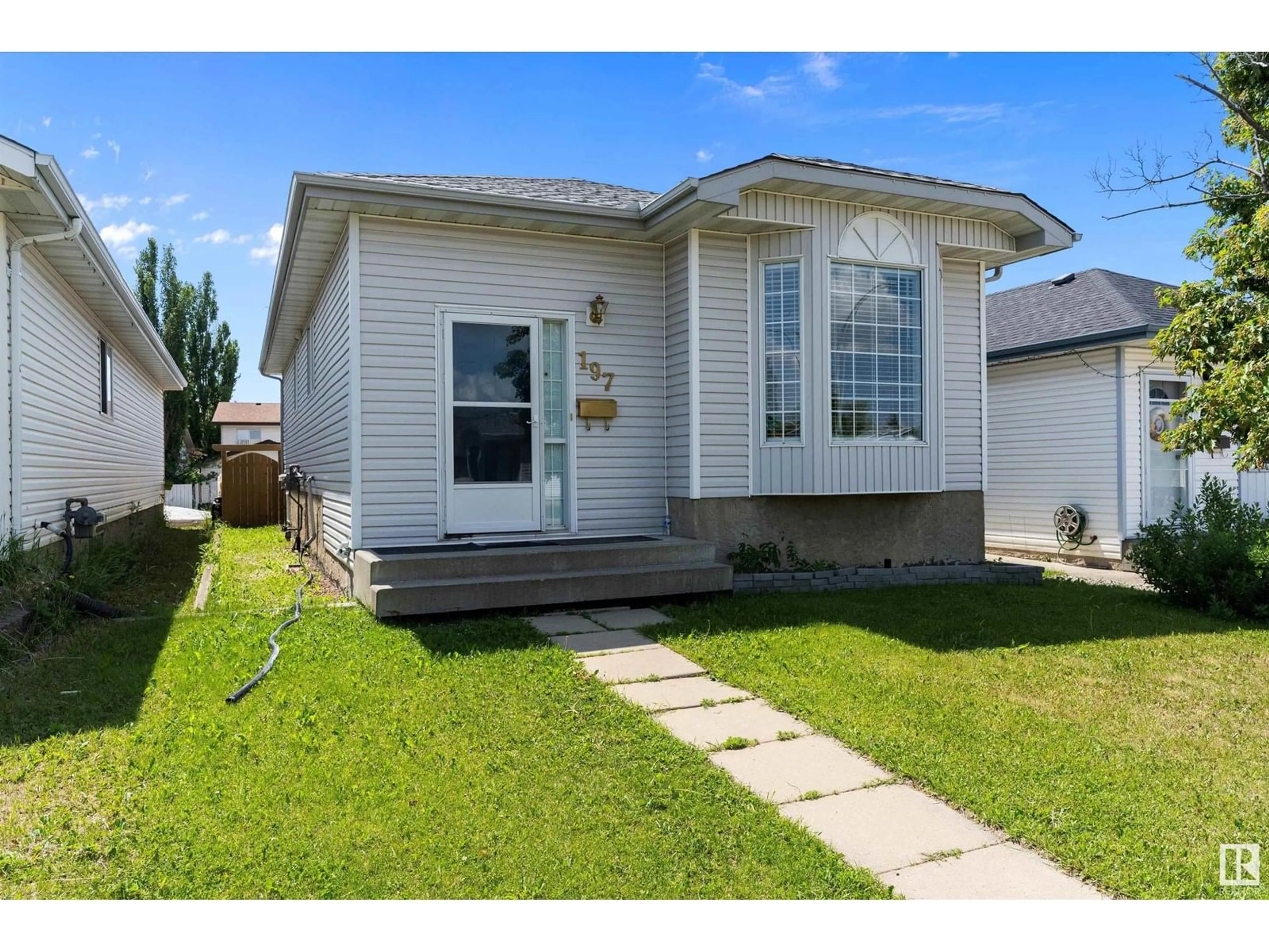 Home with vinyl exterior material, street for 197 KIRKWOOD AV, Edmonton Alberta T6L6K7