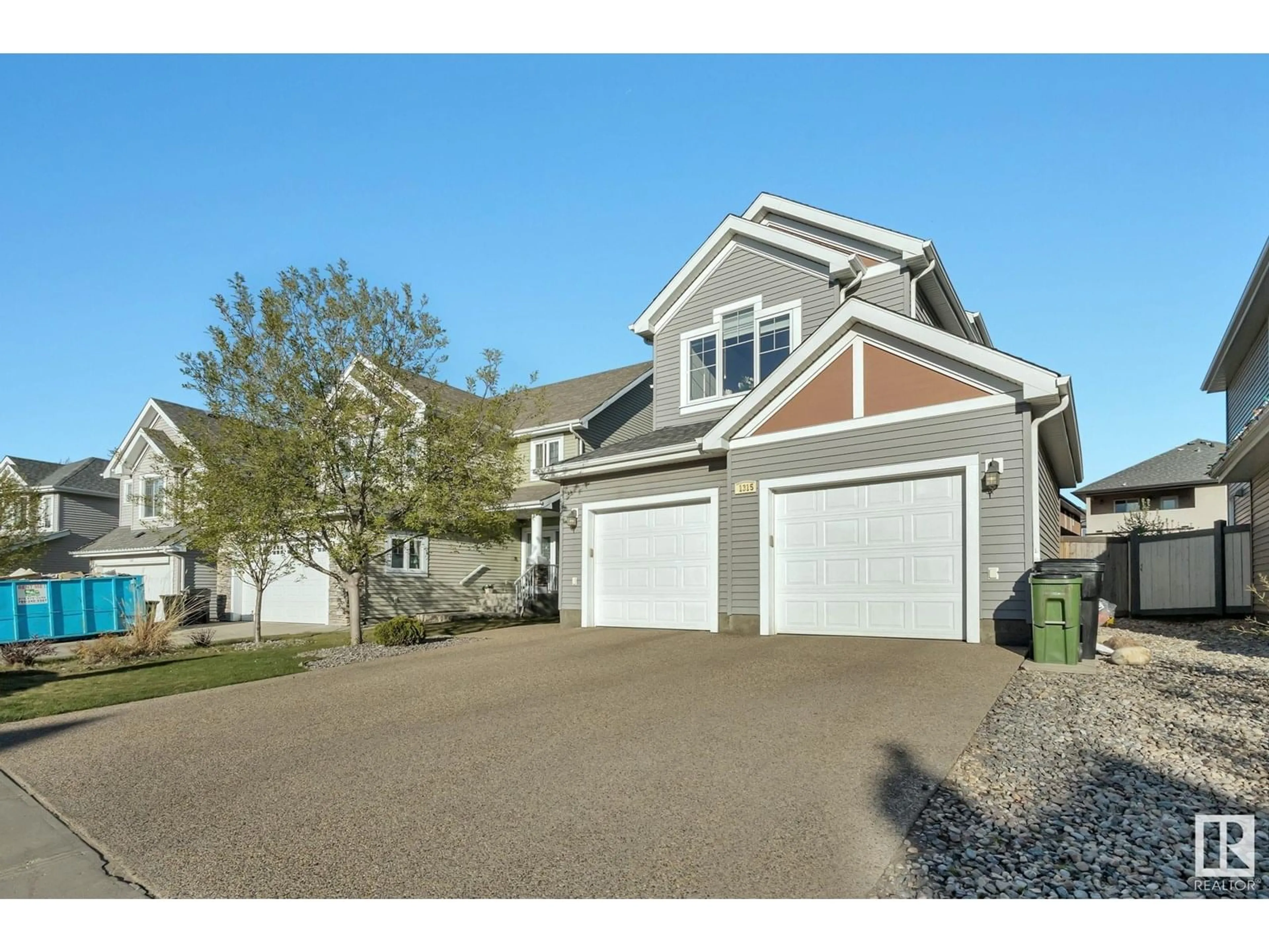 Home with vinyl exterior material, street for SW SW - 1315 72 ST, Edmonton Alberta T6X0H2