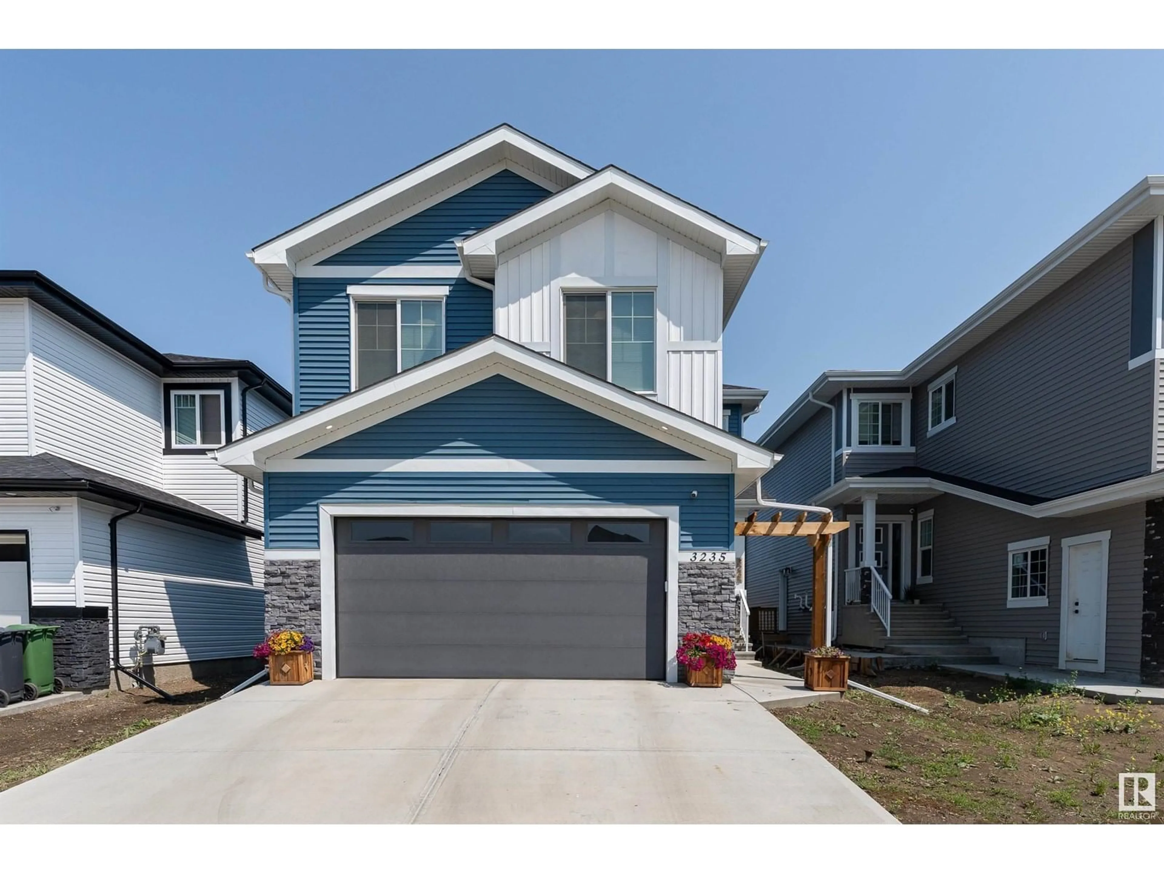 Home with vinyl exterior material, street for 3235 PELERIN CR, Beaumont Alberta T4X2Z1