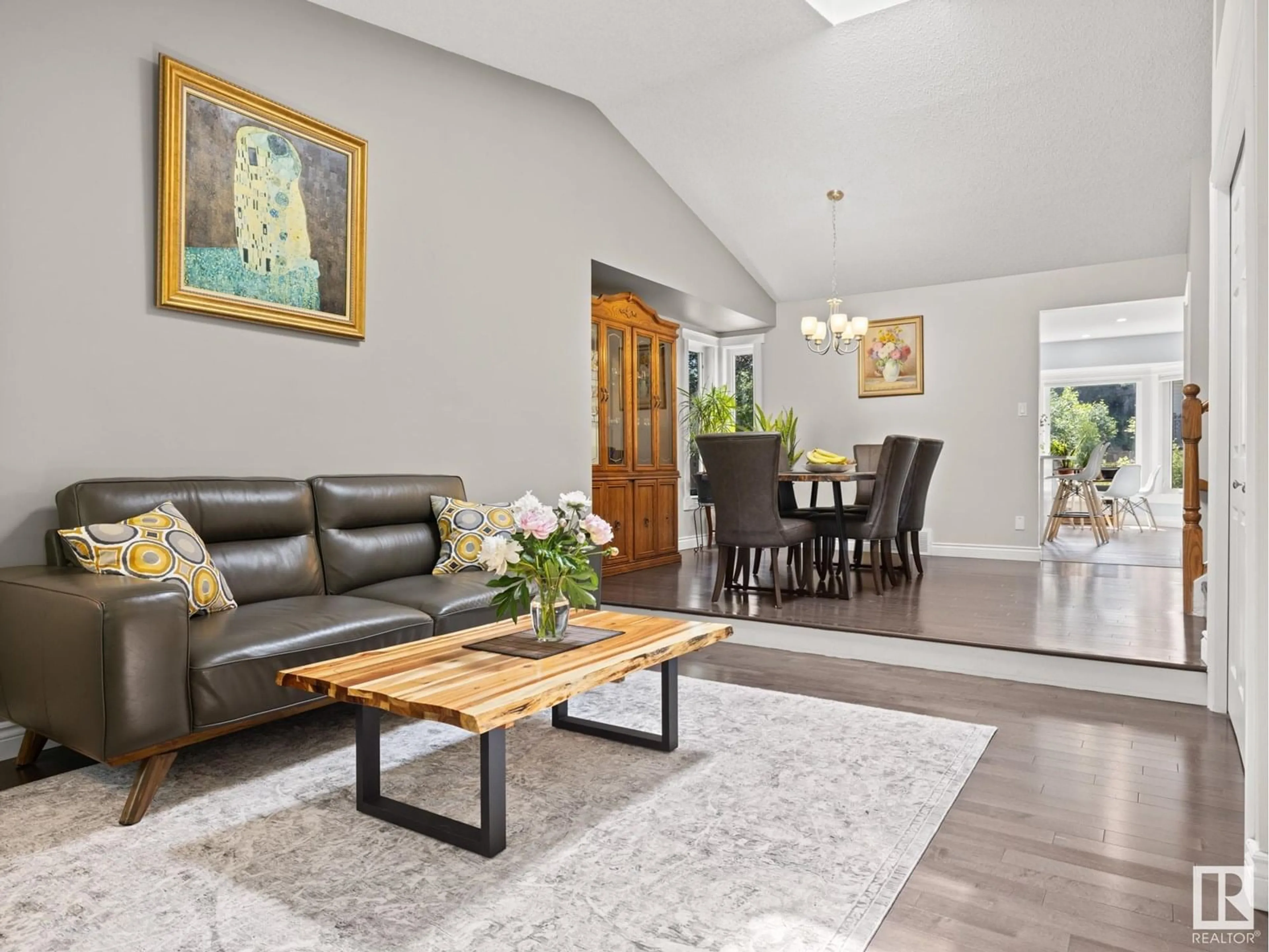 Living room with furniture, wood/laminate floor for NW - 14815 39 AV, Edmonton Alberta T6R1J6