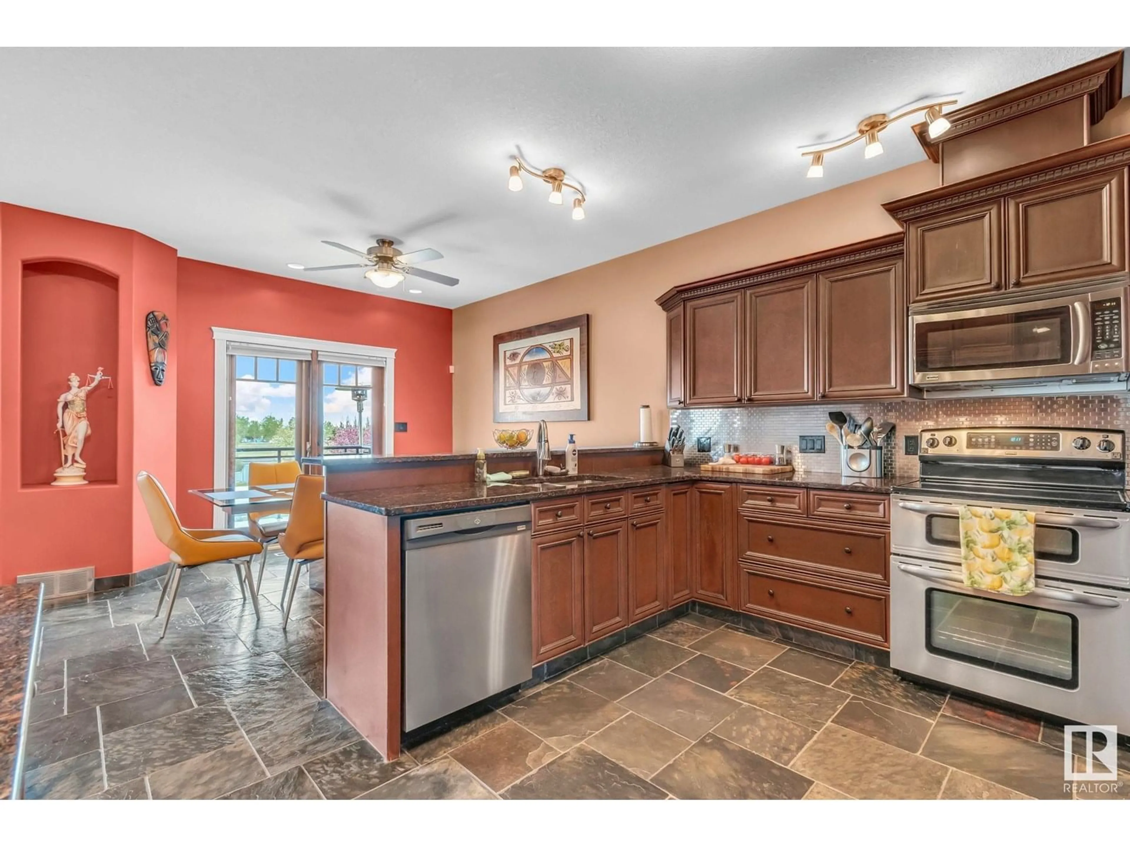Open concept kitchen, ceramic/tile floor for 8069 166A AV, Edmonton Alberta T5Z3W1