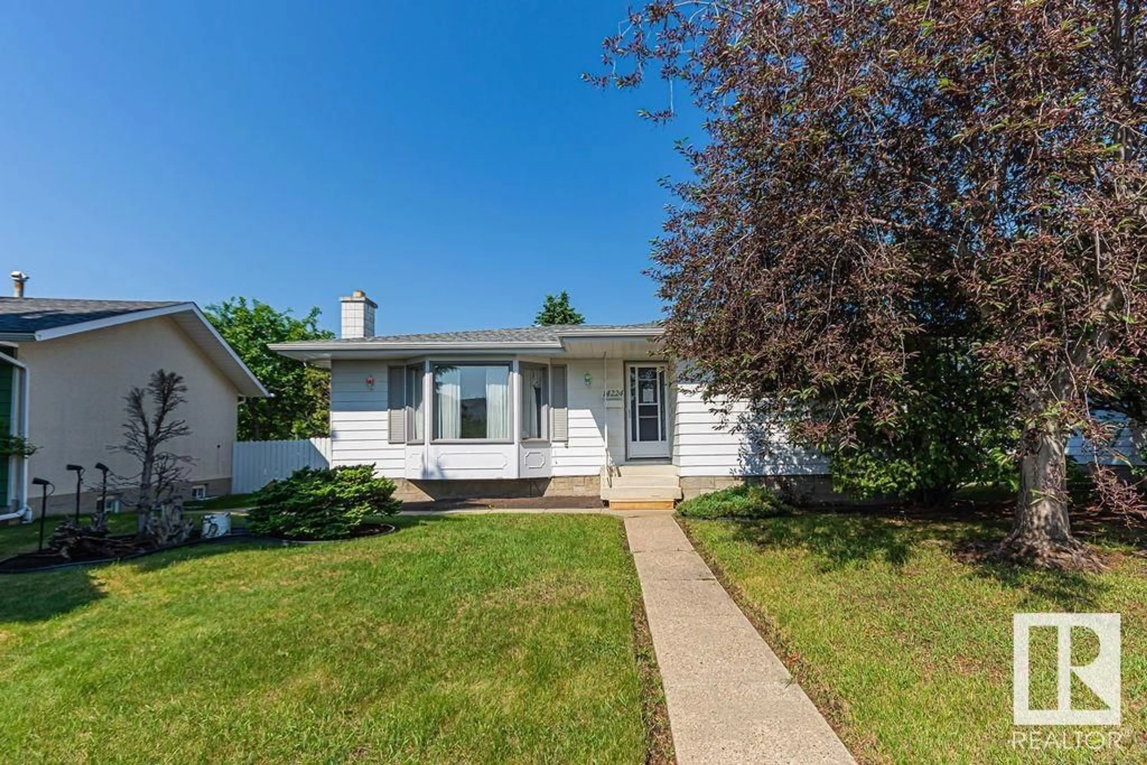 Home with vinyl exterior material, street for NW - 14224 78 ST, Edmonton Alberta T5C1H5