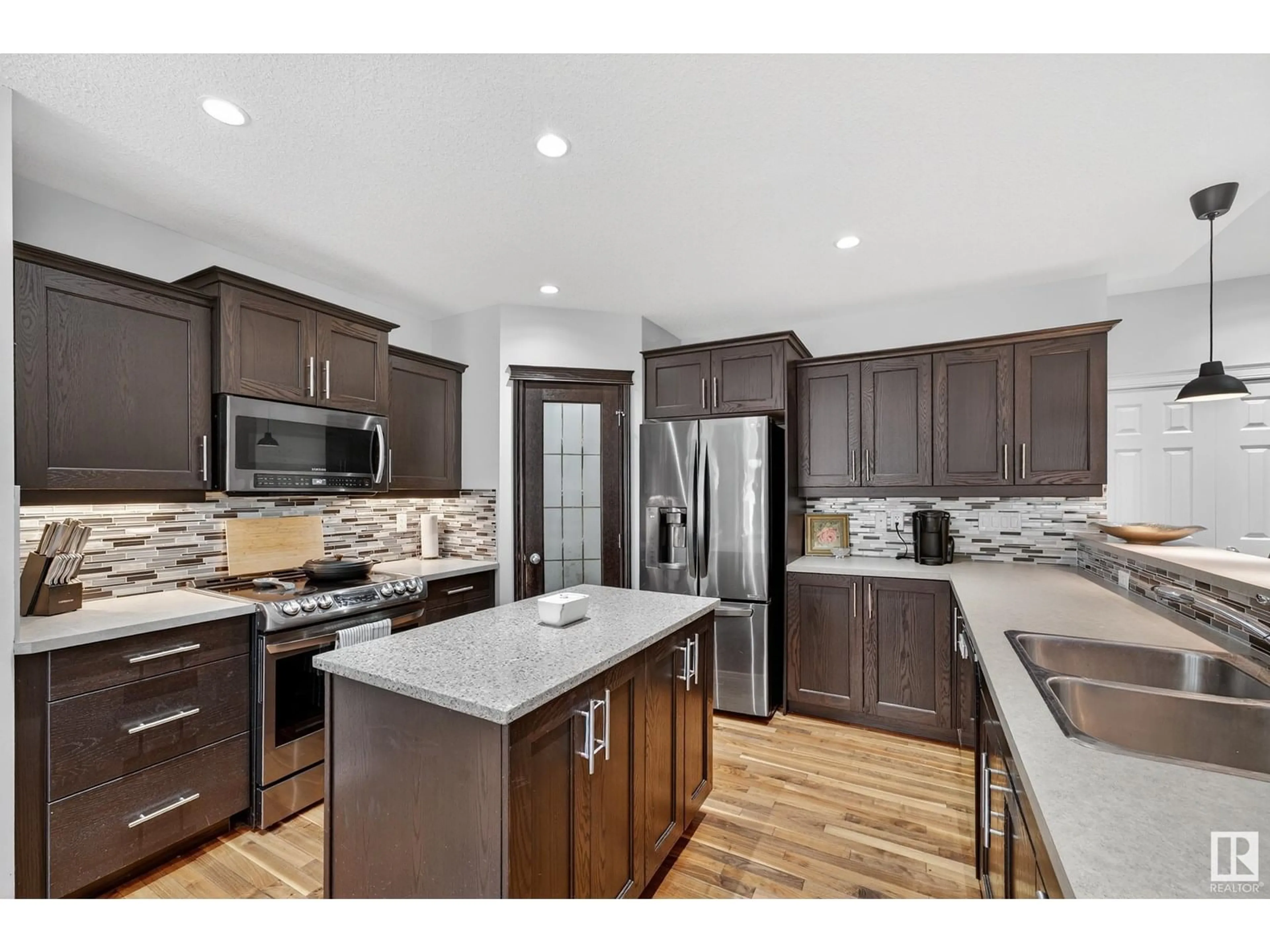 Open concept kitchen, unknown for 16904 57 ST, Edmonton Alberta T5Y0K4