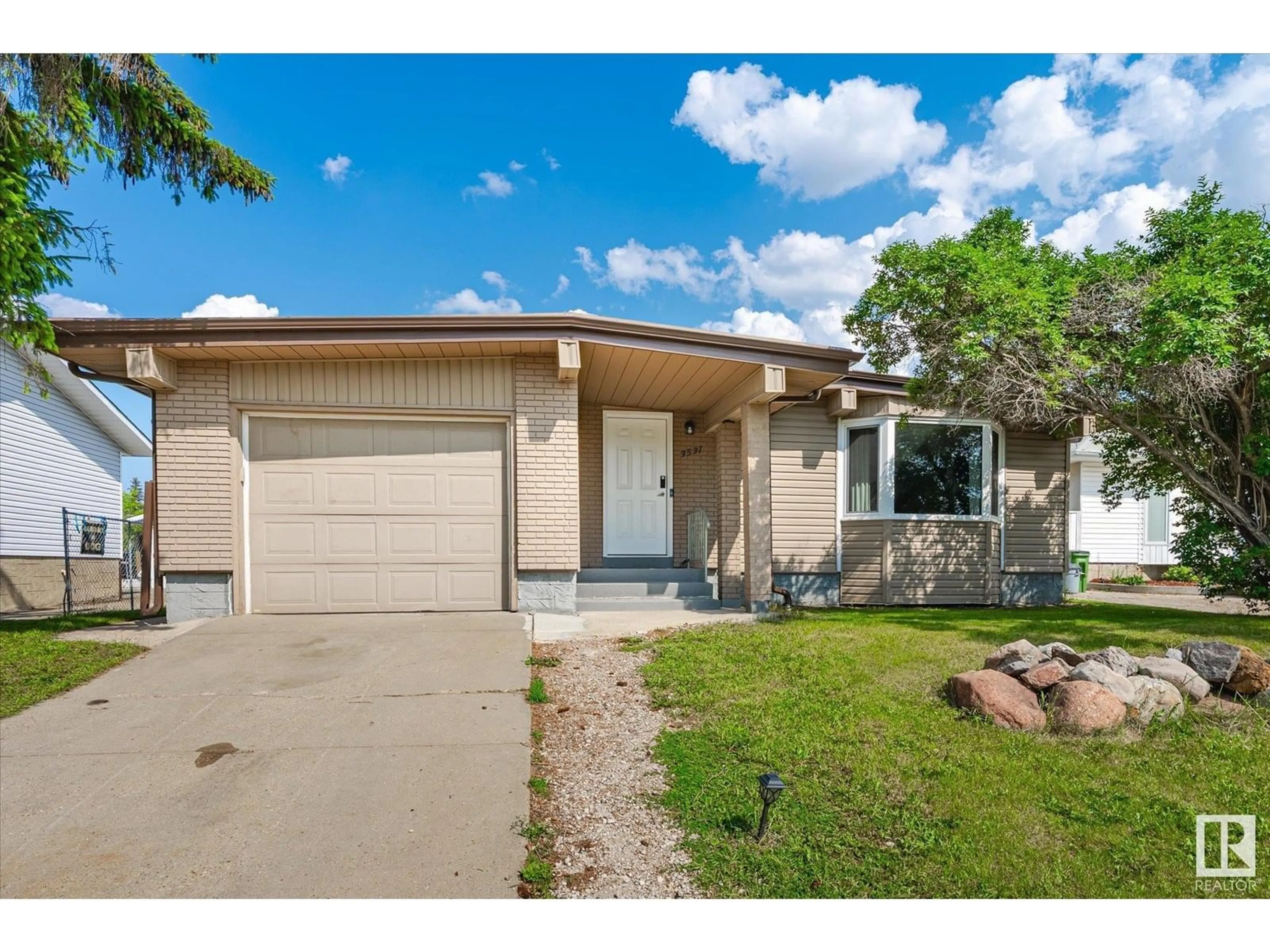 Home with vinyl exterior material, street for NW - 3531 106 ST, Edmonton Alberta T6J2L2