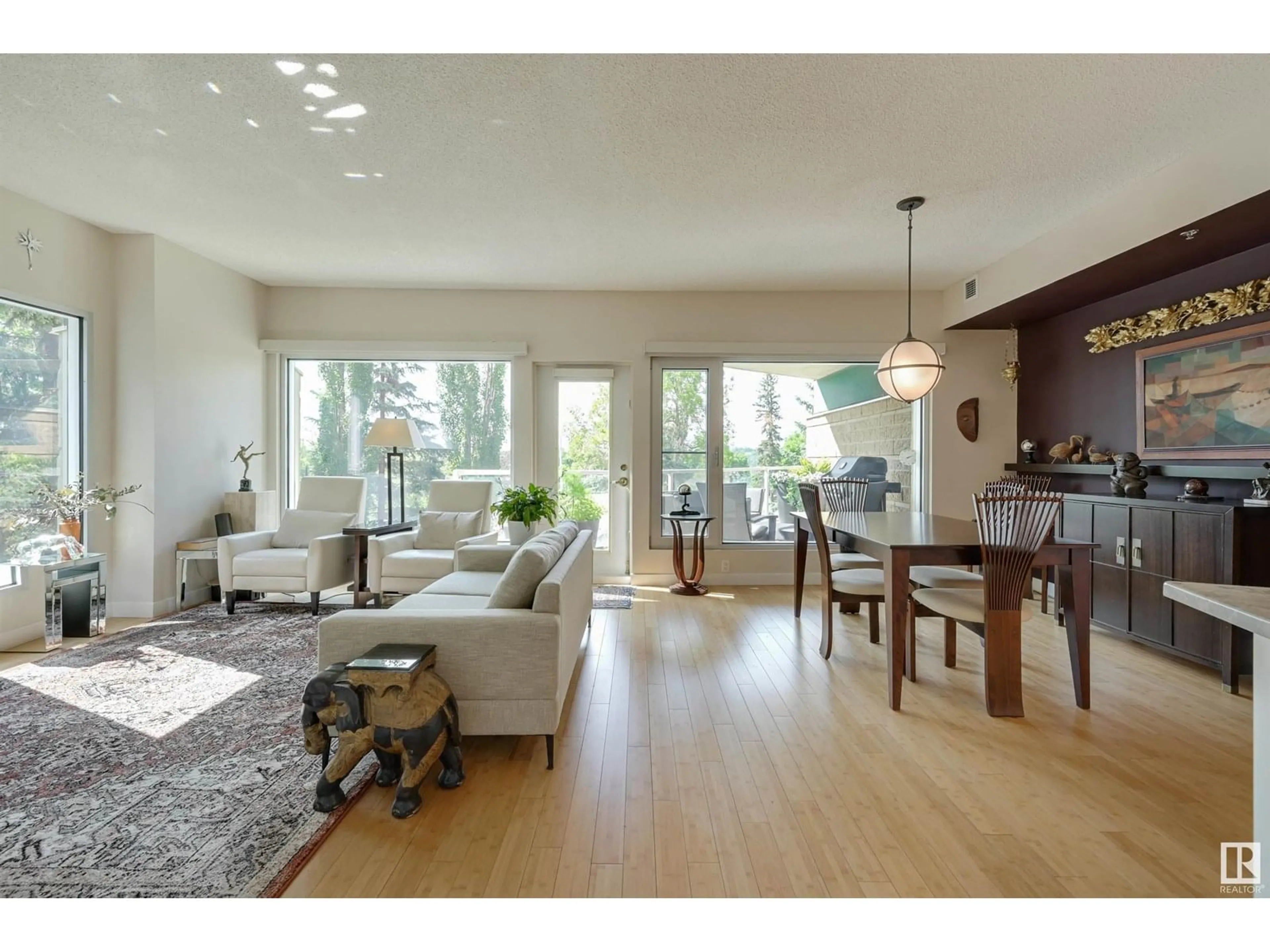 Living room with furniture, wood/laminate floor for #204 - 9708 110 ST, Edmonton Alberta T5K2W3