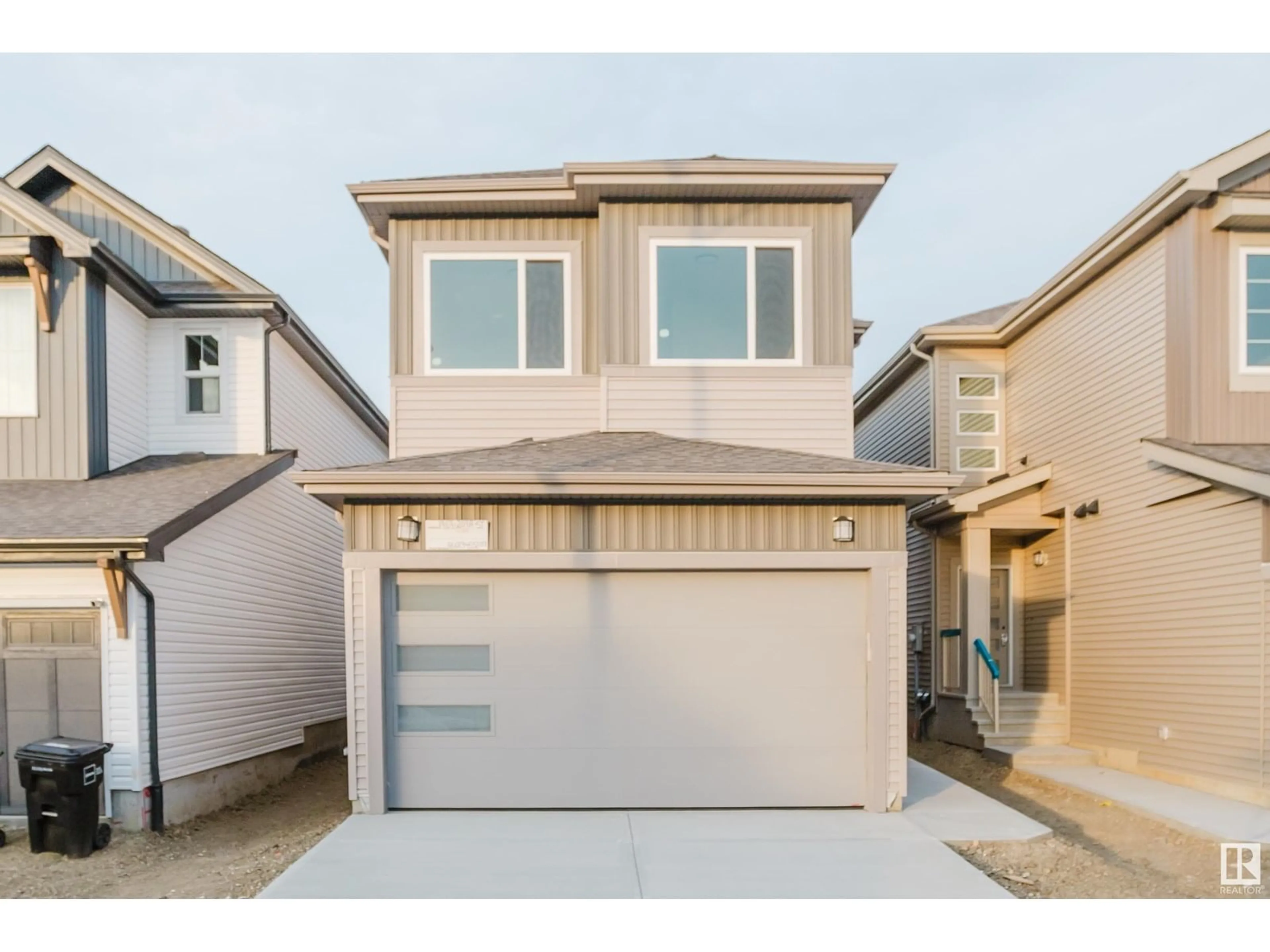 Home with vinyl exterior material, street for 1969 209A ST, Edmonton Alberta T6M3C9