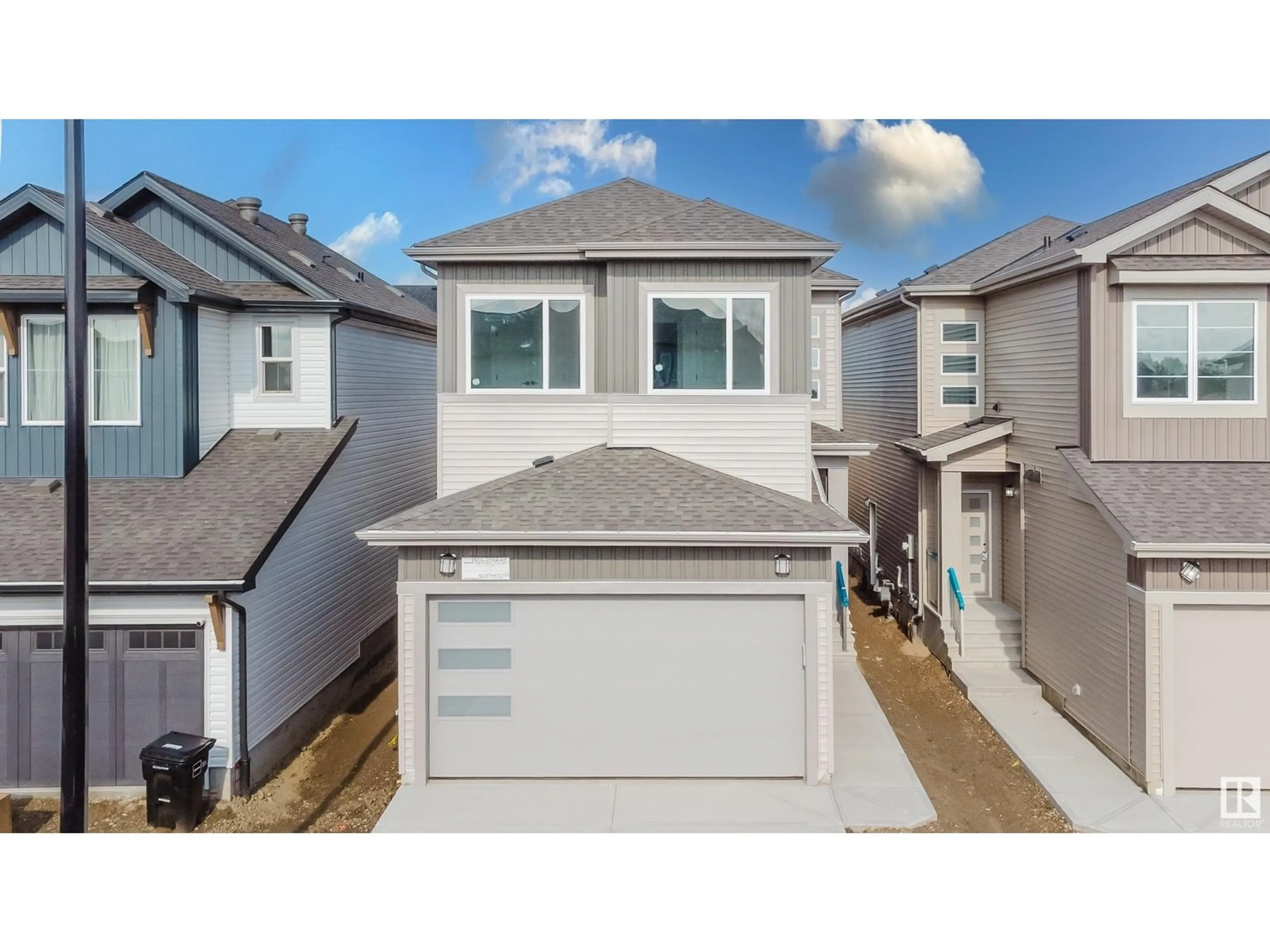 A pic from outside/outdoor area/front of a property/back of a property/a pic from drone, street for 1969 209A ST, Edmonton Alberta T6M3C9