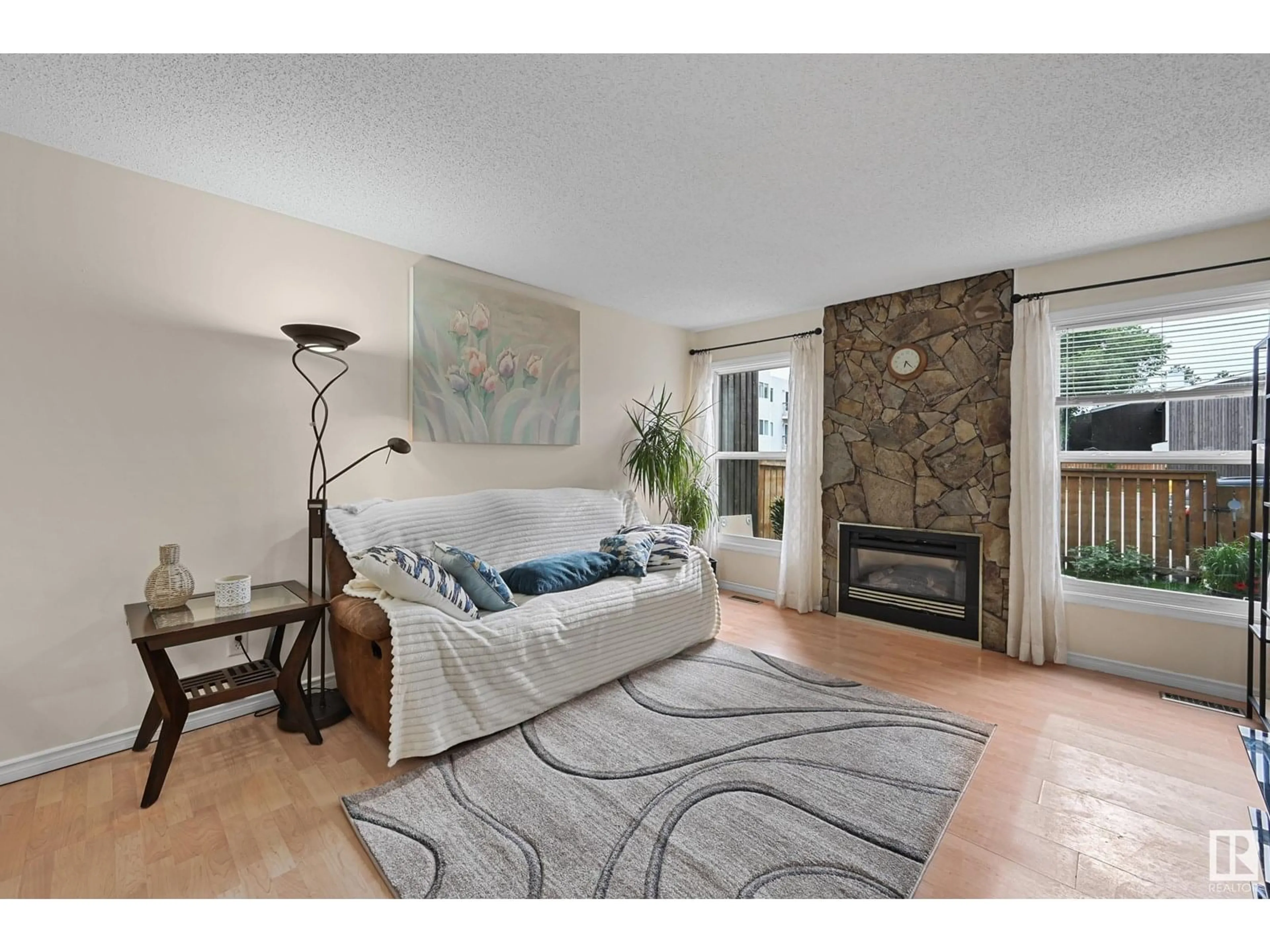 Living room with furniture, unknown for 18425 66 AV, Edmonton Alberta T5T2M1