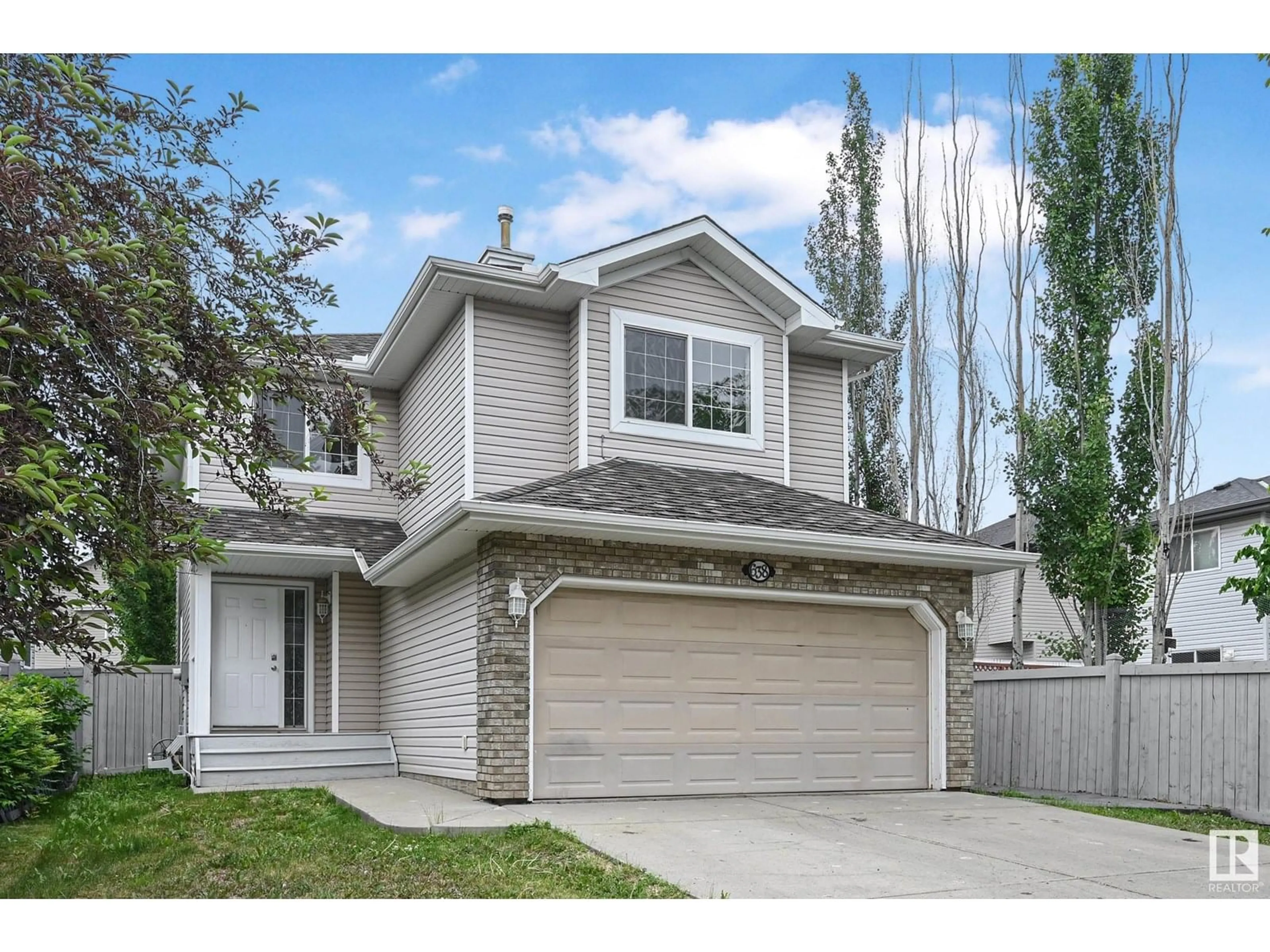 Home with vinyl exterior material, street for 638 LEGER WY, Edmonton Alberta T6R0C1