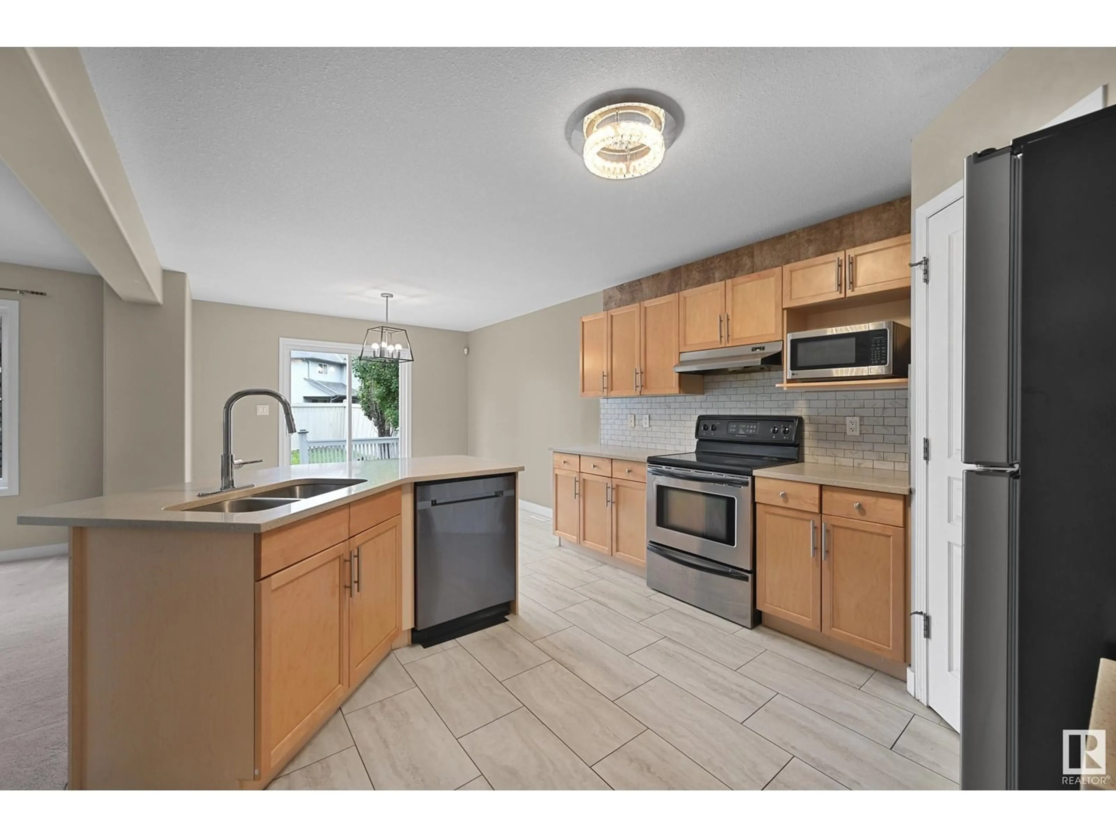 Standard kitchen, ceramic/tile floor for 638 LEGER WY, Edmonton Alberta T6R0C1