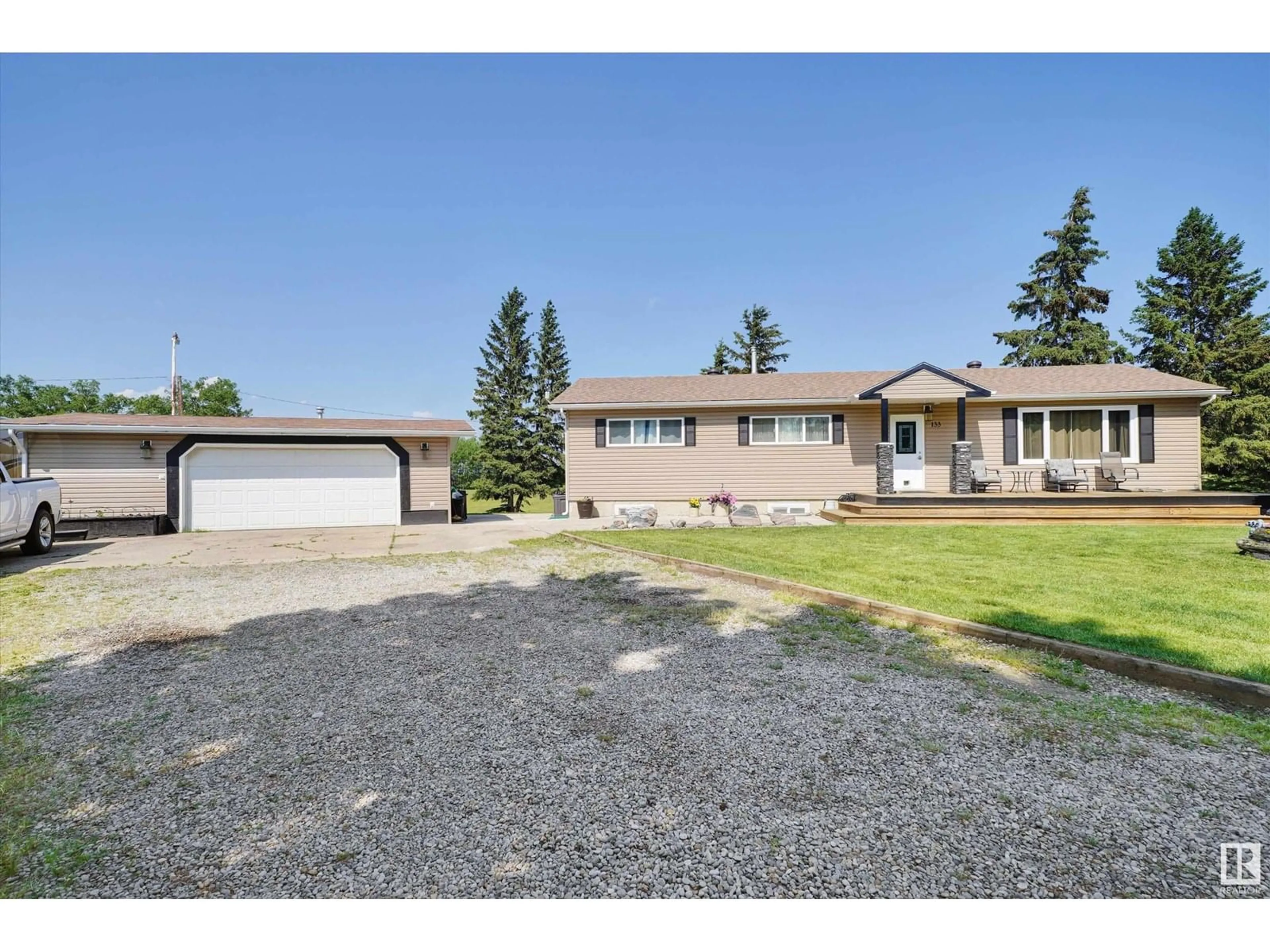 A pic from outside/outdoor area/front of a property/back of a property/a pic from drone, street for 133 21316 TWP ROAD 534, Rural Strathcona County Alberta T8G2B1
