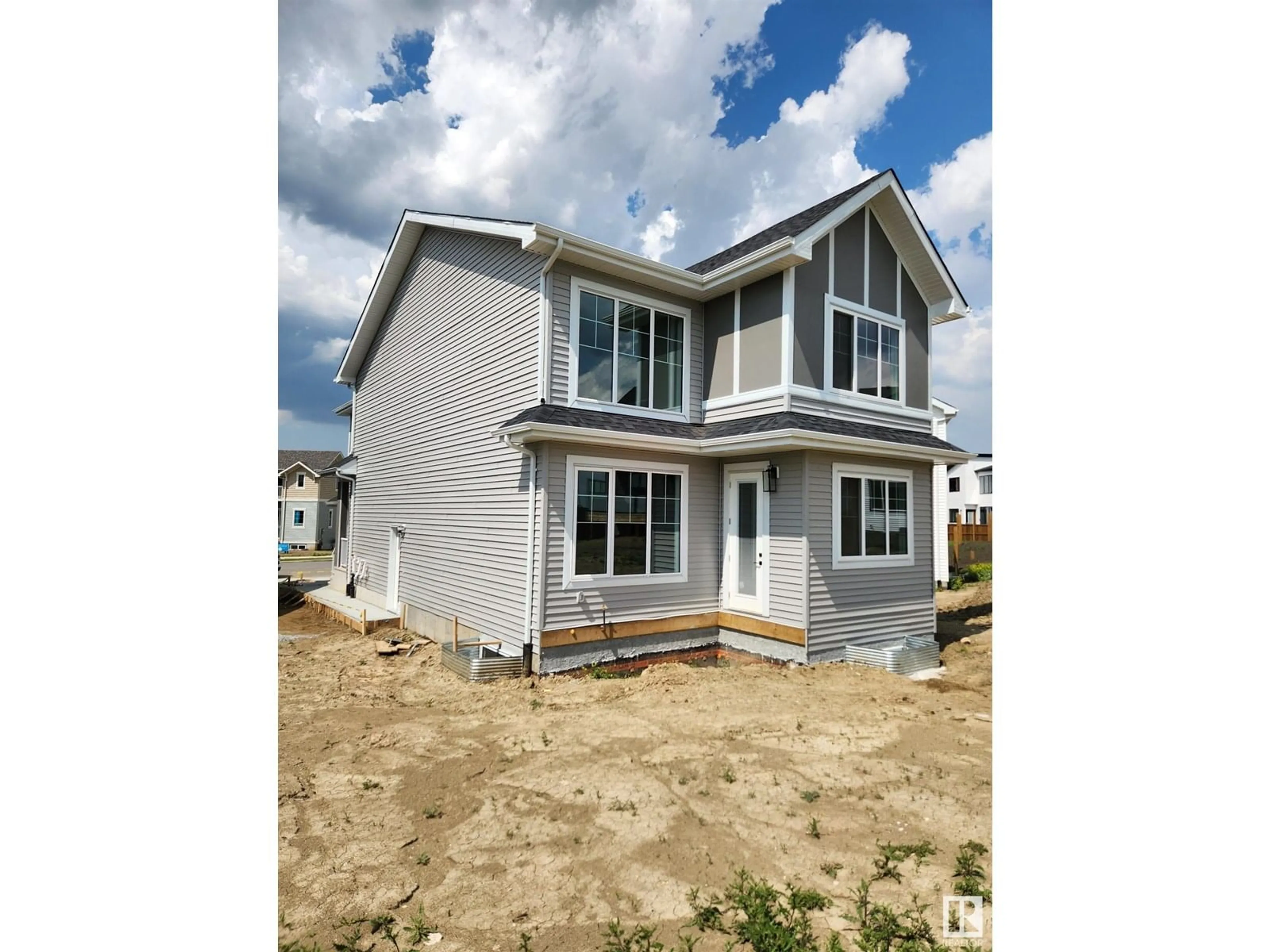 Home with vinyl exterior material, building for SW - 1297 PODERSKY WD, Edmonton Alberta T6E5E4
