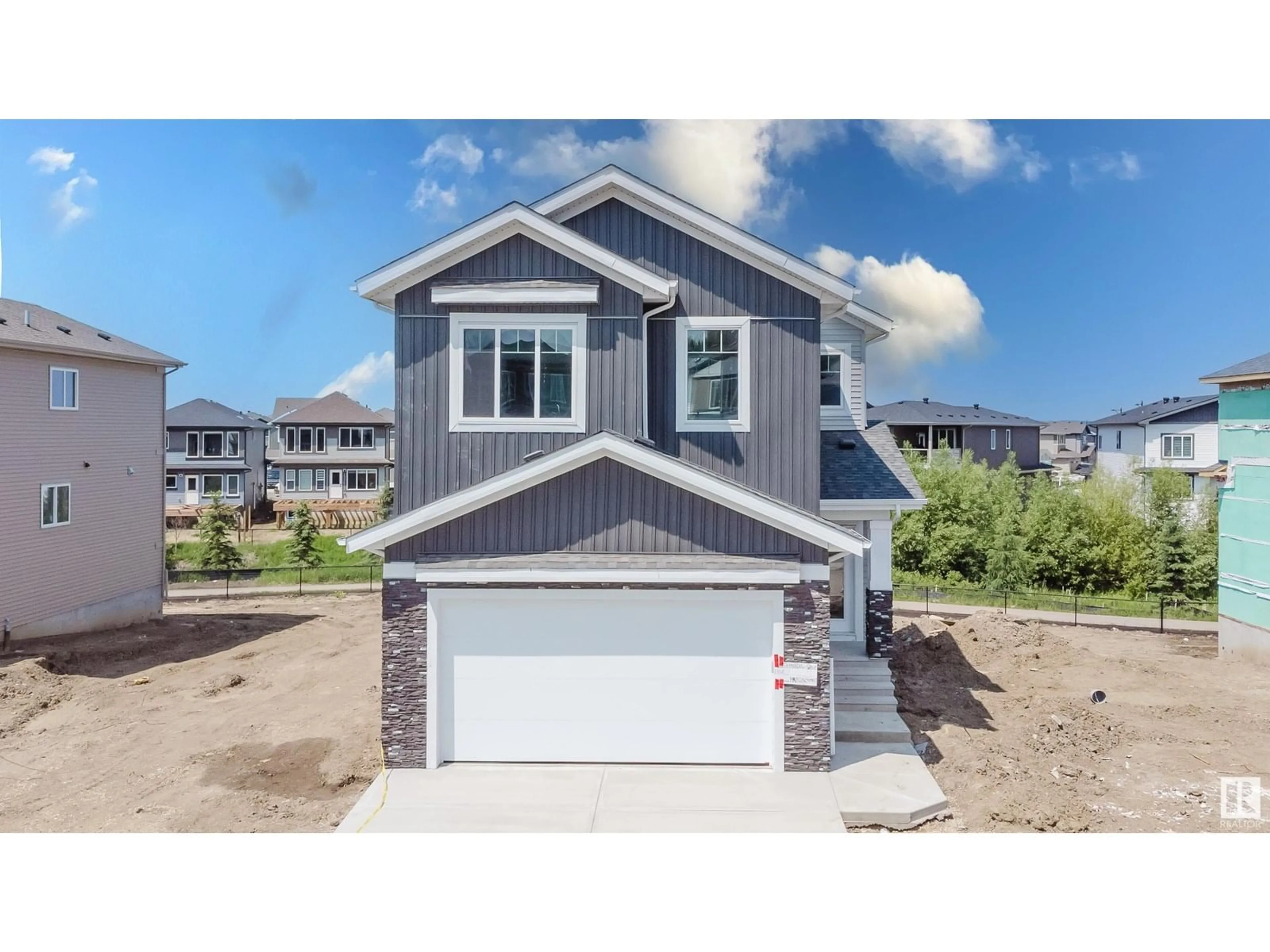 Home with vinyl exterior material, street for 73 MEADOWGROVE LN, Spruce Grove Alberta T7X0W2