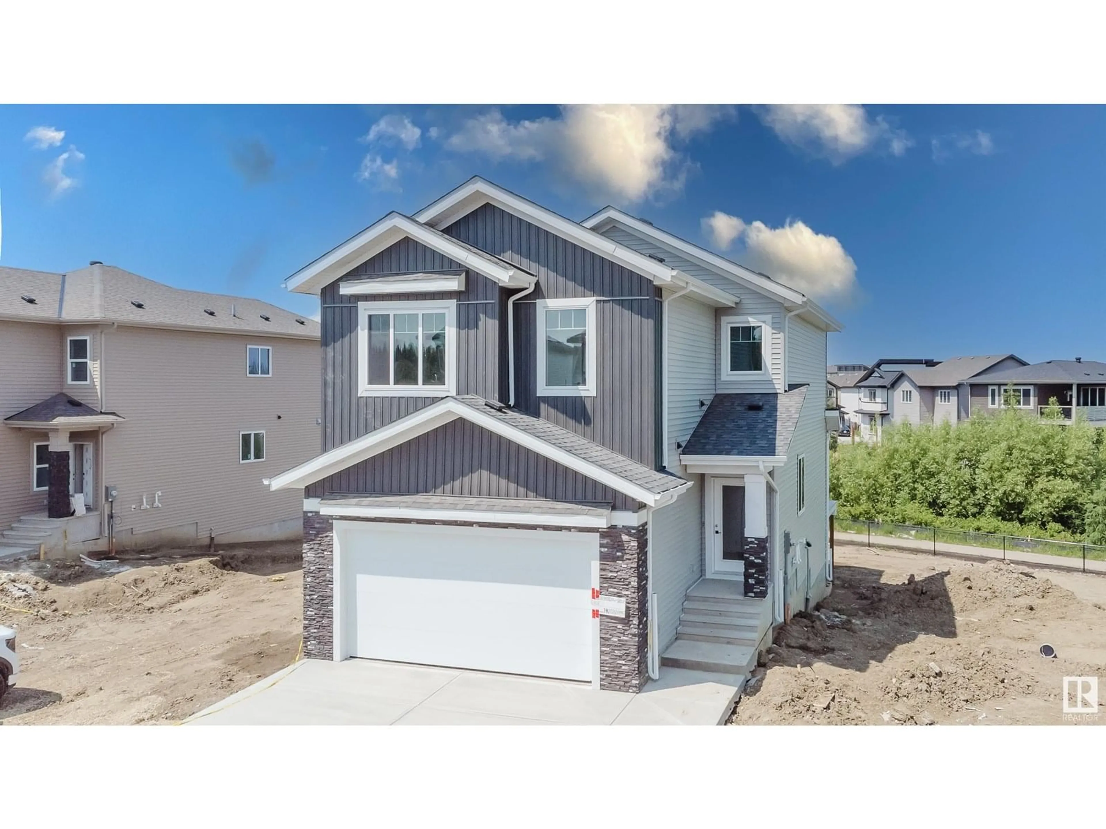 Home with vinyl exterior material, street for 73 MEADOWGROVE LN, Spruce Grove Alberta T7X0W2