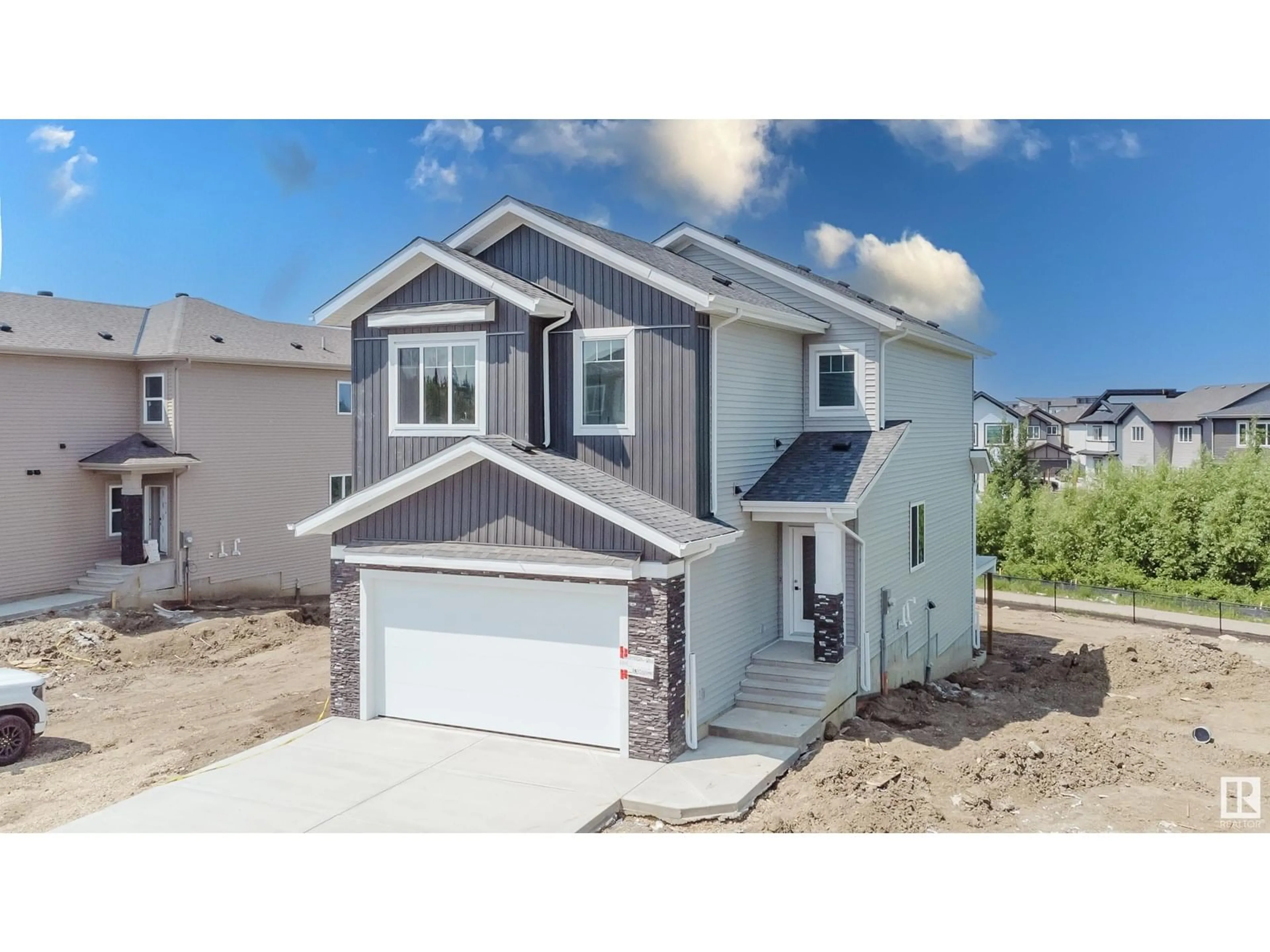 Home with vinyl exterior material, street for 73 MEADOWGROVE LN, Spruce Grove Alberta T7X0W2