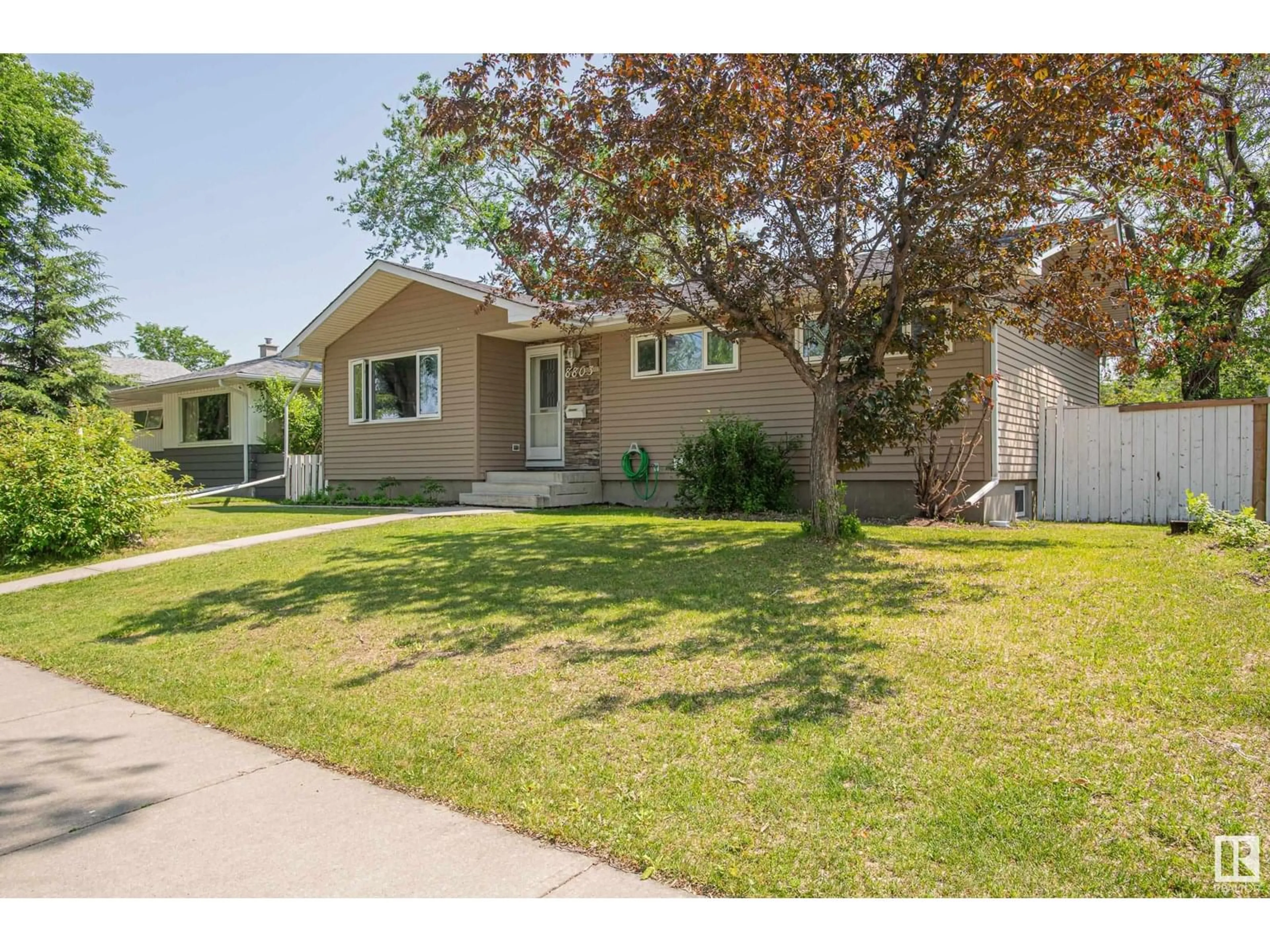 Home with vinyl exterior material, street for NW - 8803 160 ST, Edmonton Alberta T5R2H6