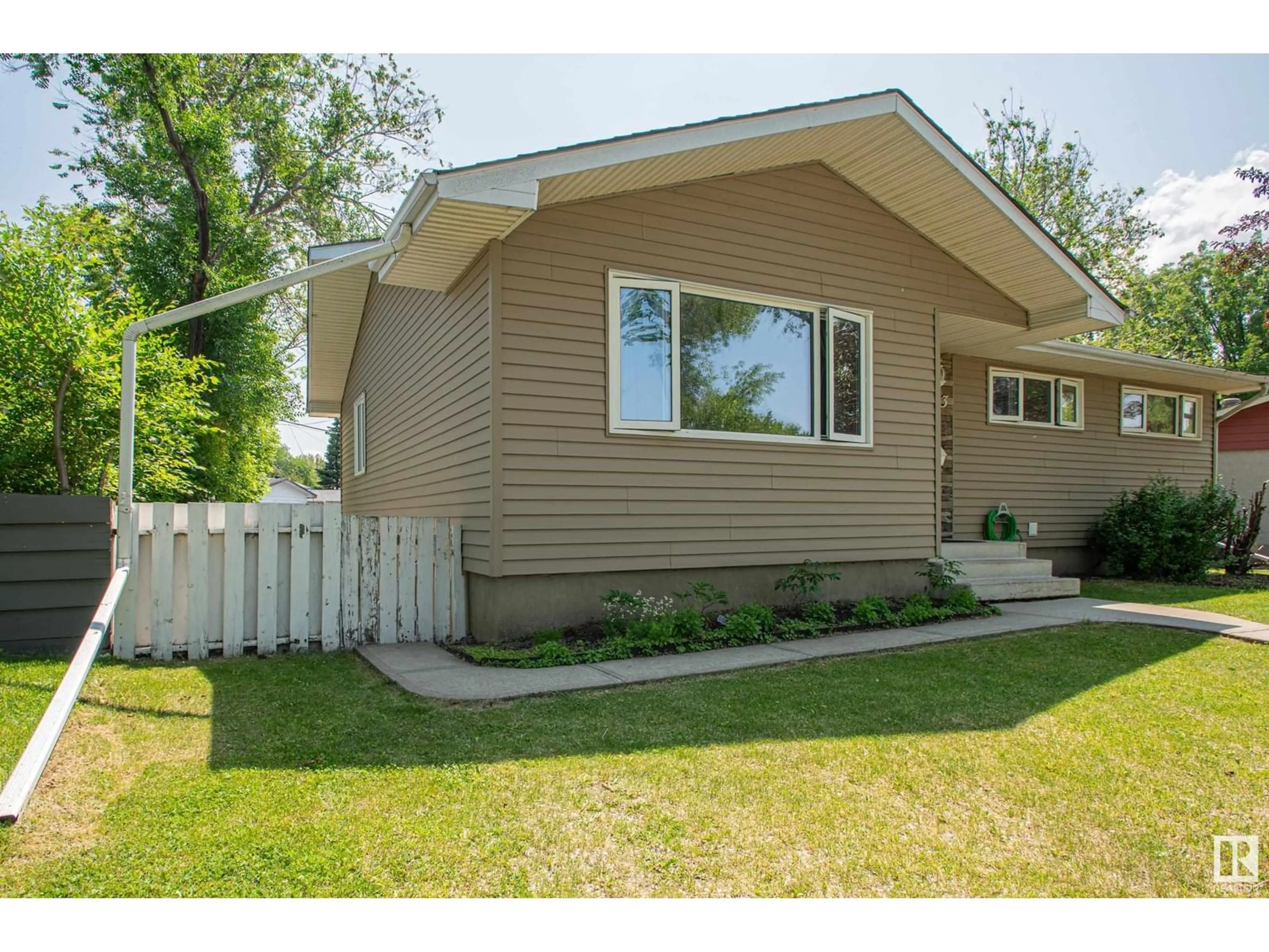 Home with vinyl exterior material, street for NW - 8803 160 ST, Edmonton Alberta T5R2H6
