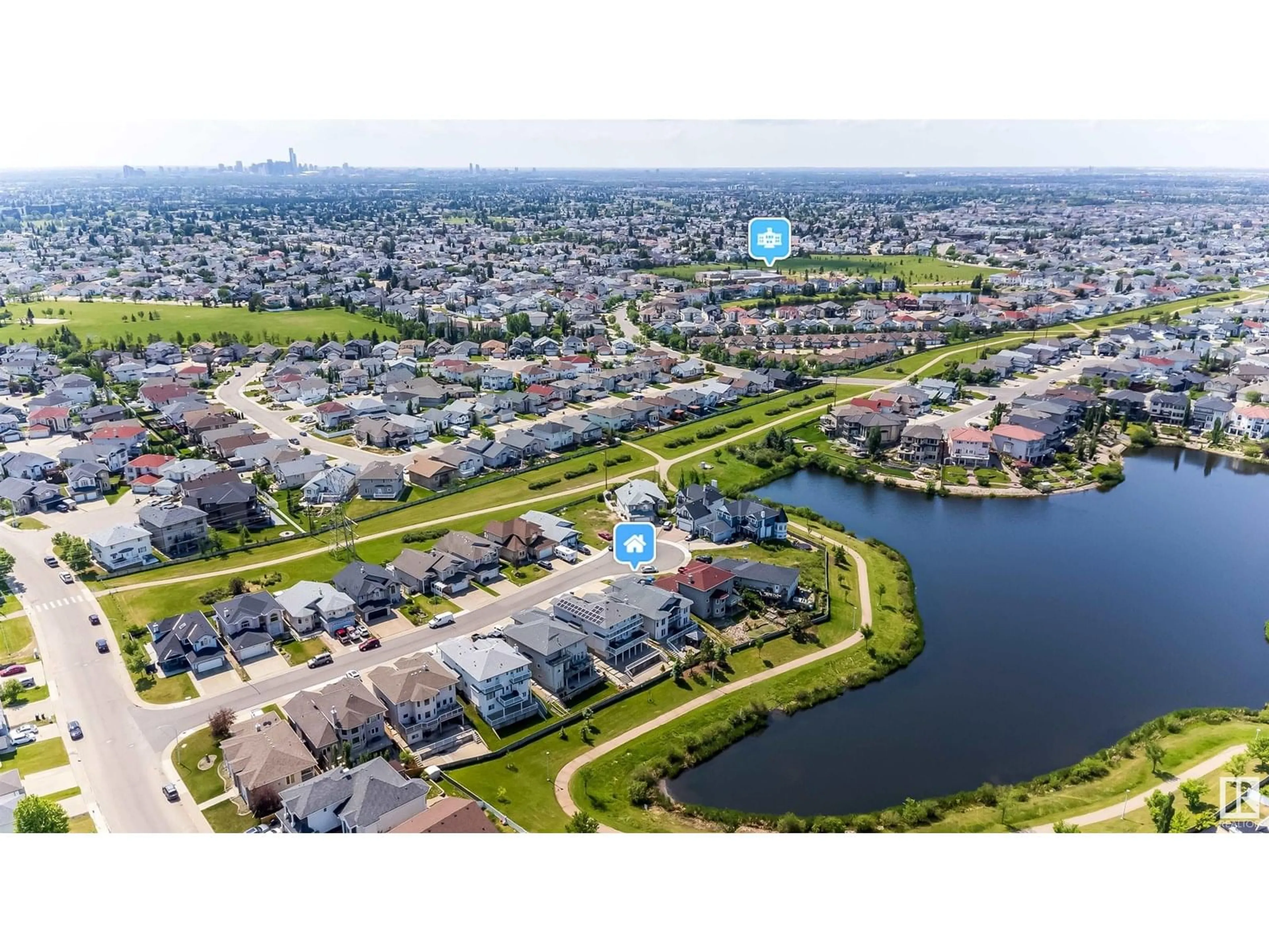 A pic from outside/outdoor area/front of a property/back of a property/a pic from drone, water/lake/river/ocean view for 6928 164 AV, Edmonton Alberta T5Z3R3