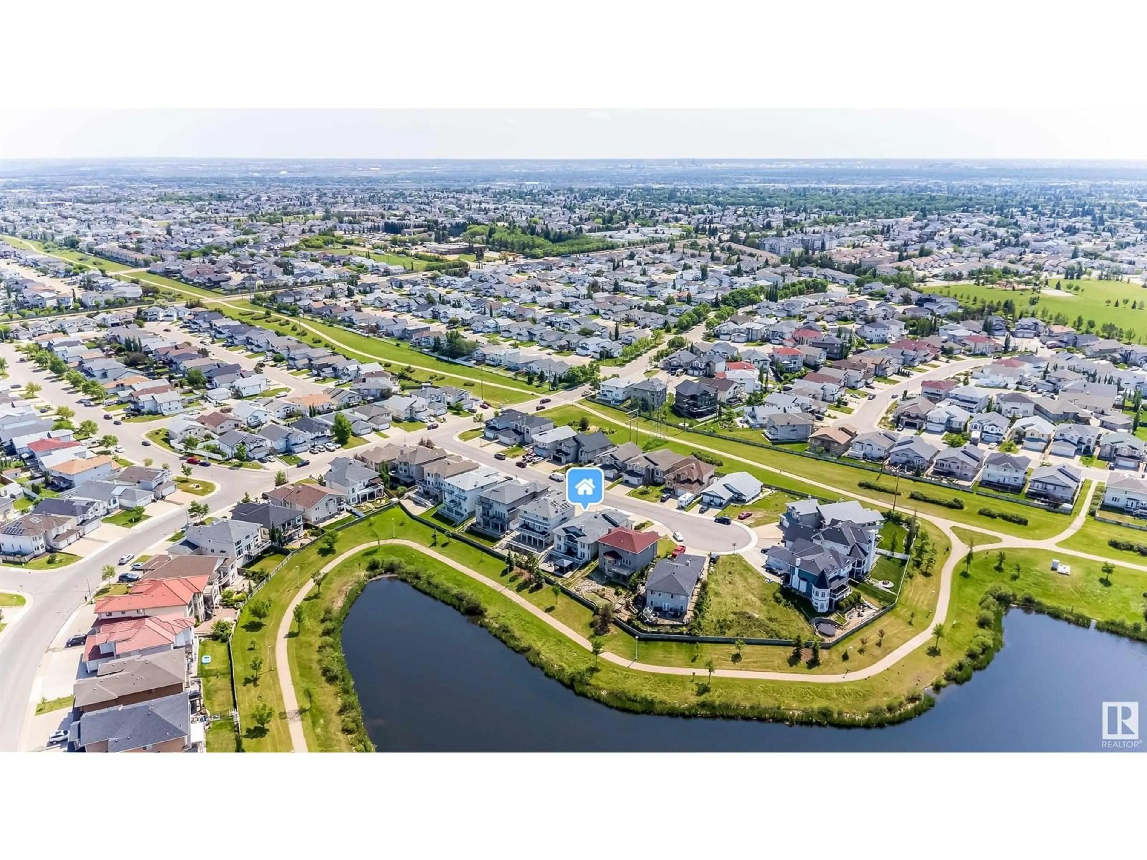 A pic from outside/outdoor area/front of a property/back of a property/a pic from drone, water/lake/river/ocean view for 6928 164 AV, Edmonton Alberta T5Z3R3