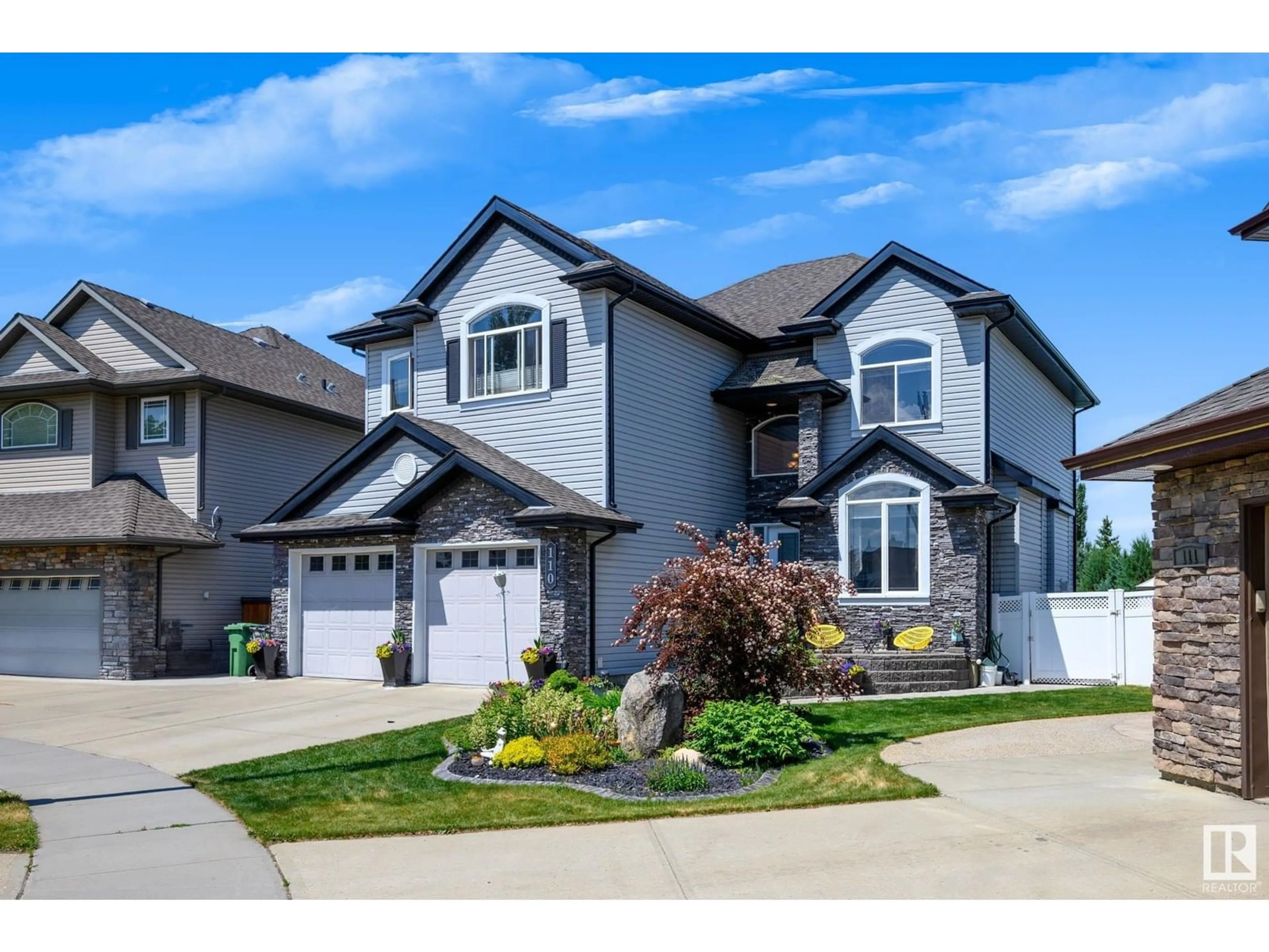 Home with vinyl exterior material, street for 110 RUE MARSEILLE, Beaumont Alberta T4X1W1