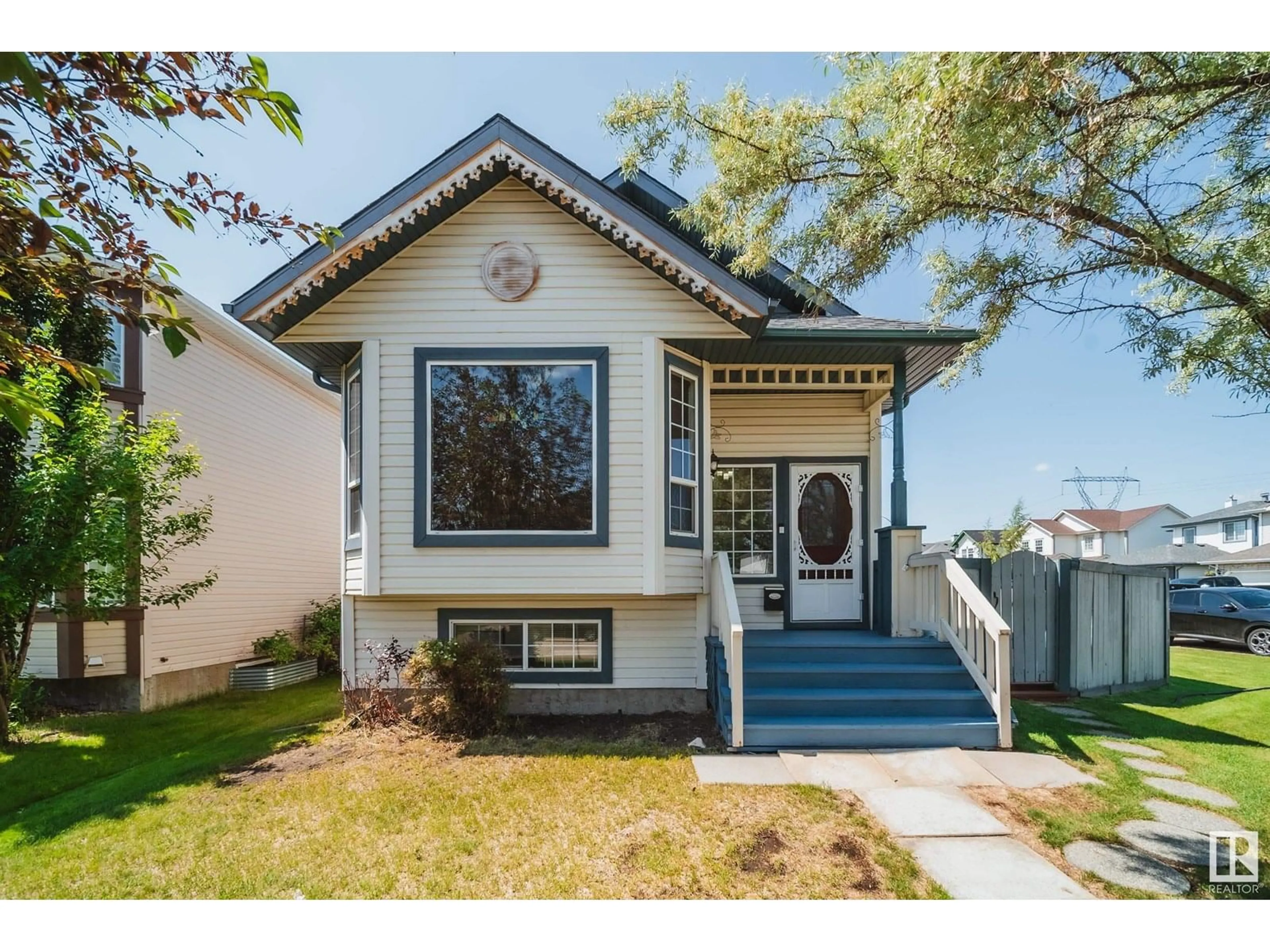 Home with vinyl exterior material, street for 15056 131 ST, Edmonton Alberta T6V1K3
