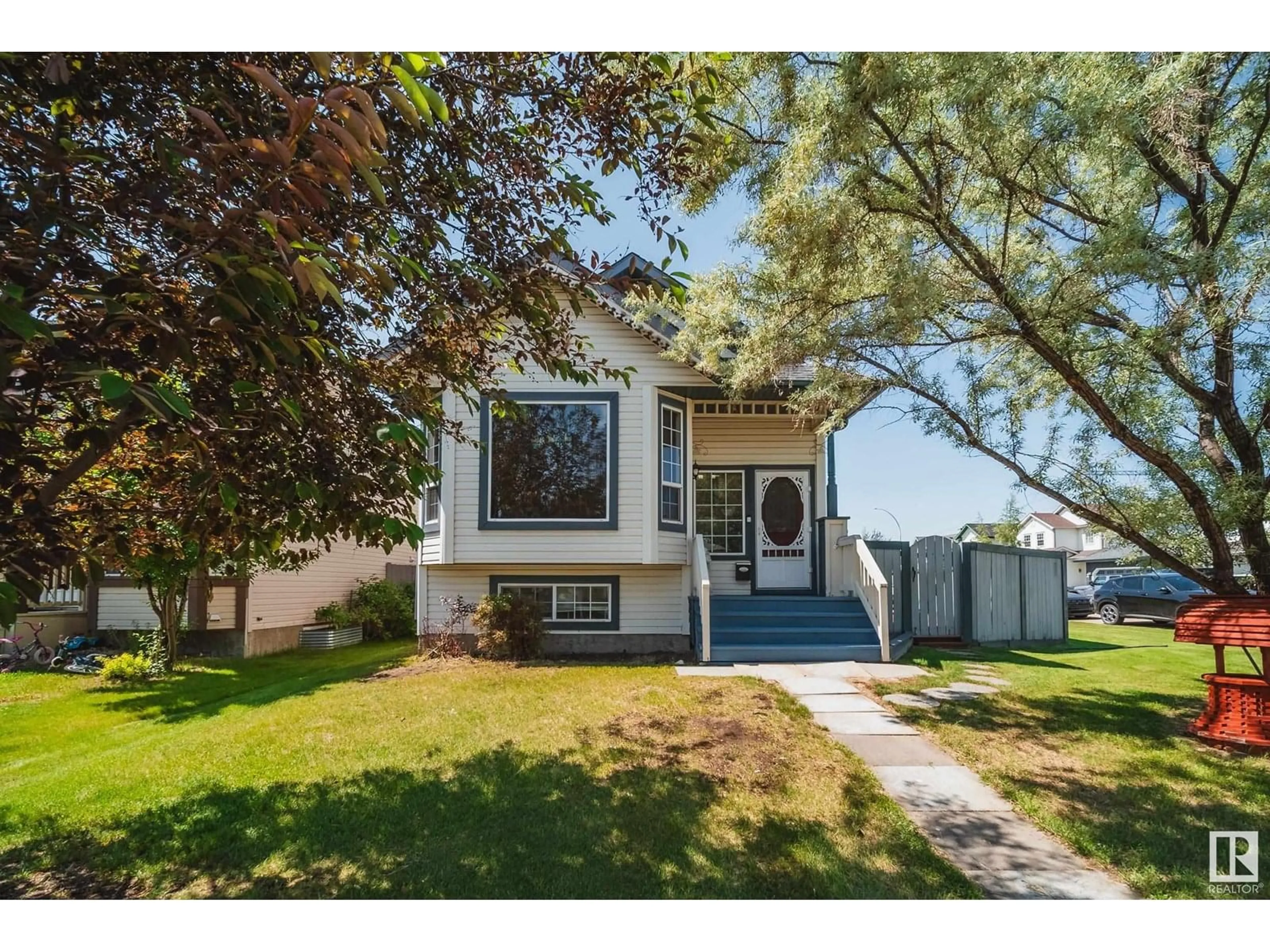 Home with vinyl exterior material, street for 15056 131 ST, Edmonton Alberta T6V1K3