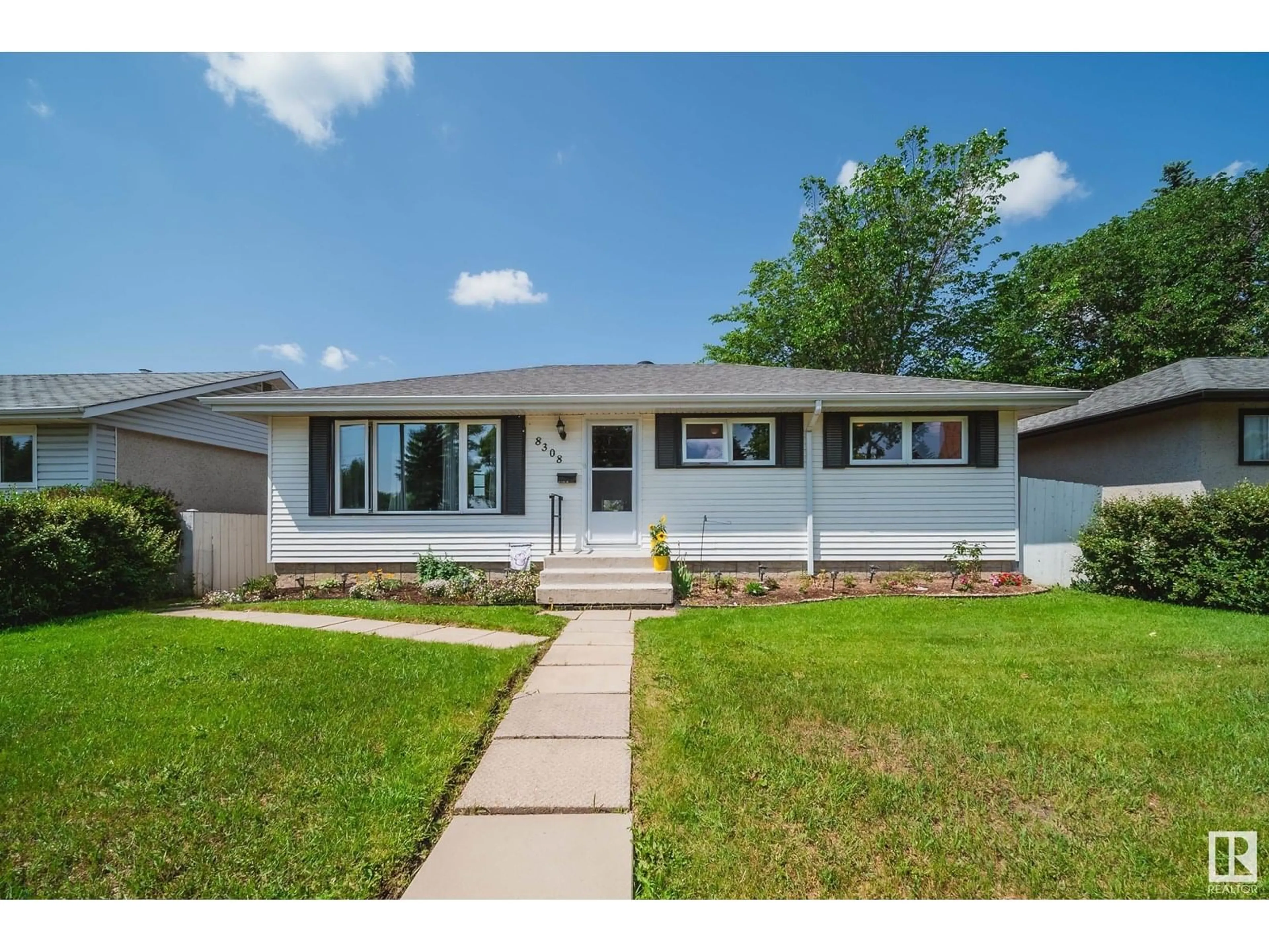 Home with vinyl exterior material, street for 8308 156 ST, Edmonton Alberta T5R1Y4