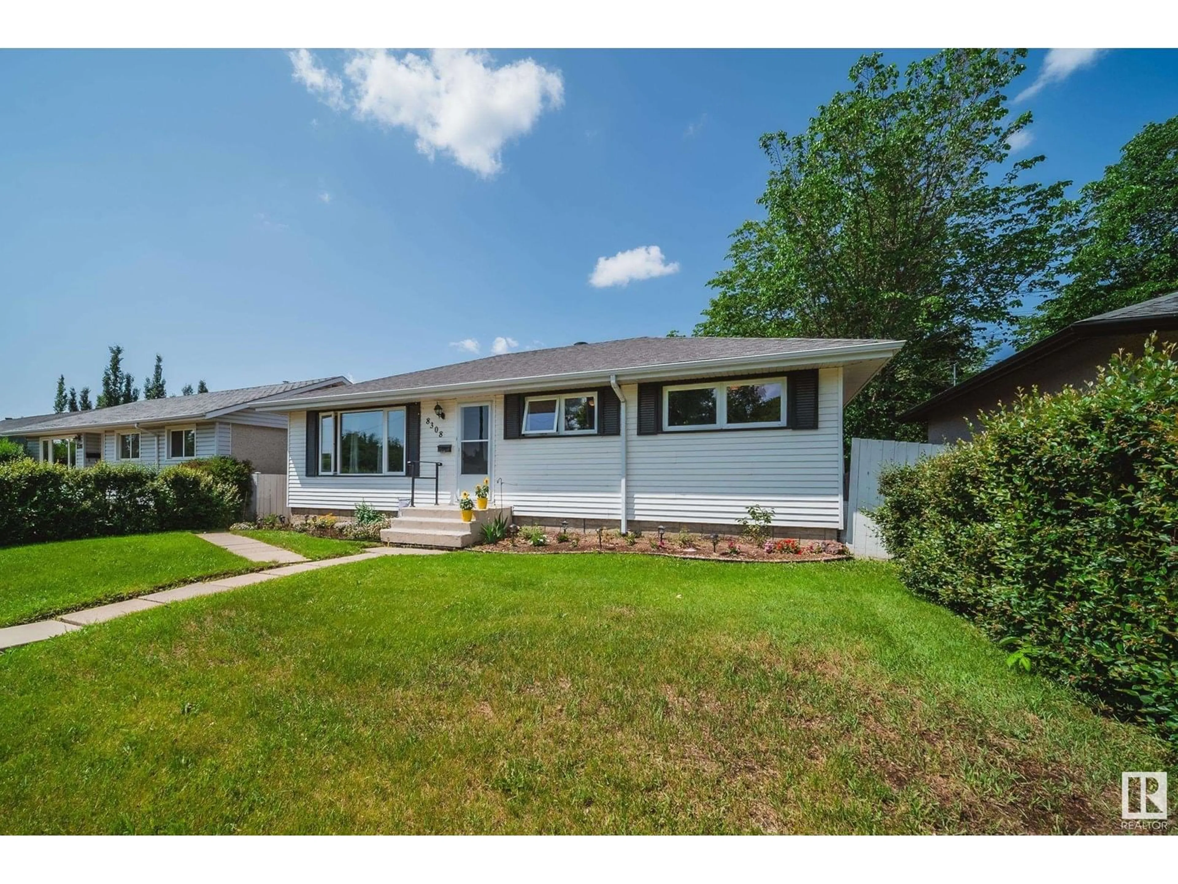 Home with vinyl exterior material, street for 8308 156 ST, Edmonton Alberta T5R1Y4