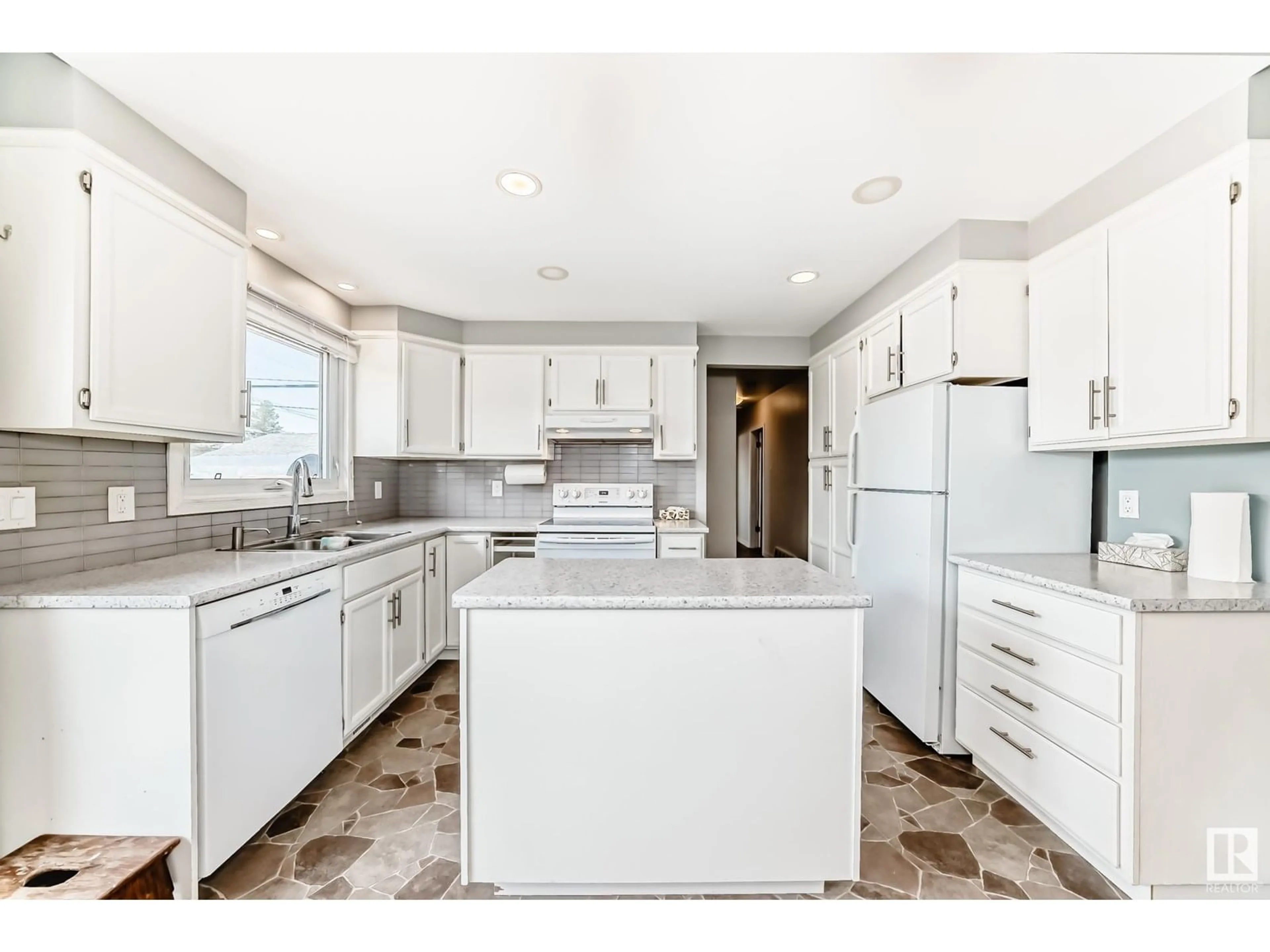 Open concept kitchen, ceramic/tile floor for NW - 10932 165 ST, Edmonton Alberta T5P3T7