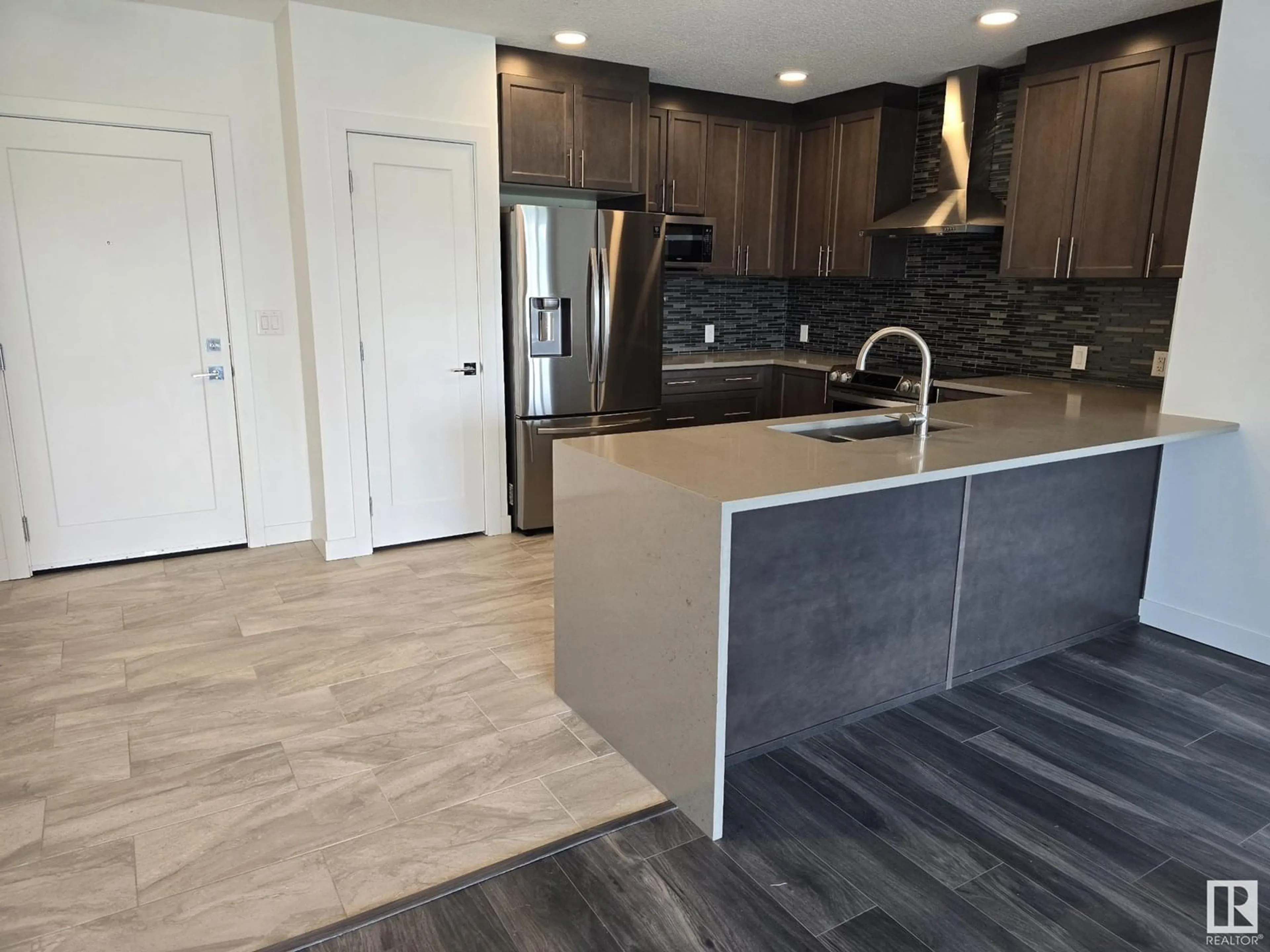 Open concept kitchen, unknown for #206 - 1316 WINDERMERE WY, Edmonton Alberta T6W0P1