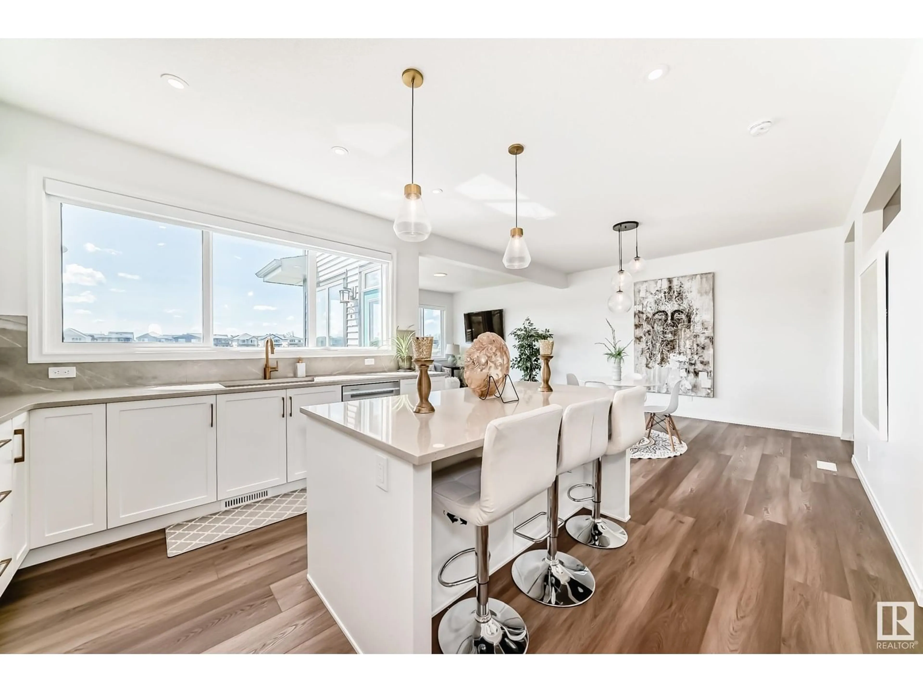 Open concept kitchen, wood/laminate floor for NW - 2532 206 ST, Edmonton Alberta T6M1P1
