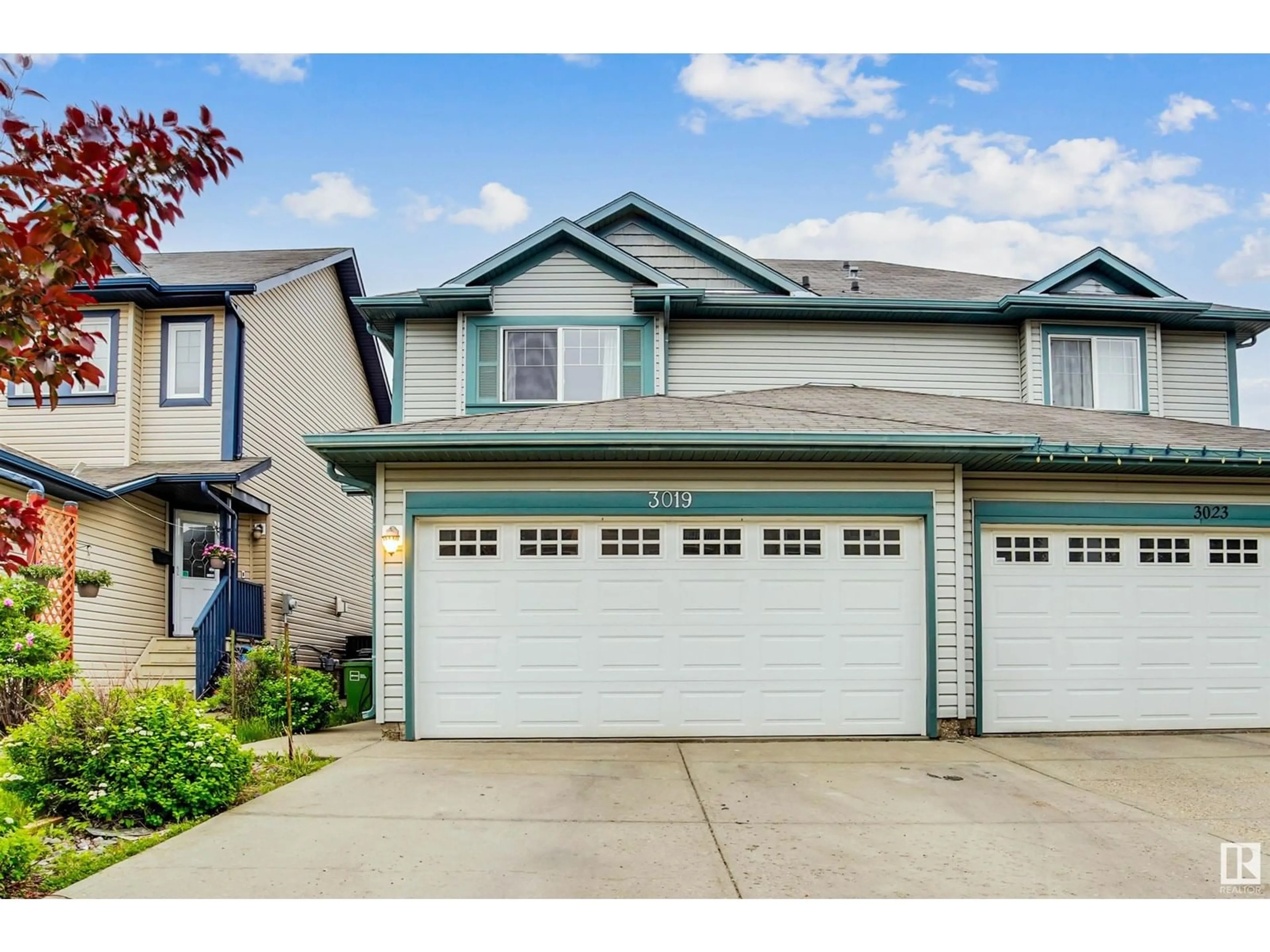Home with vinyl exterior material, street for 3019 22 AV, Edmonton Alberta T6T0J9