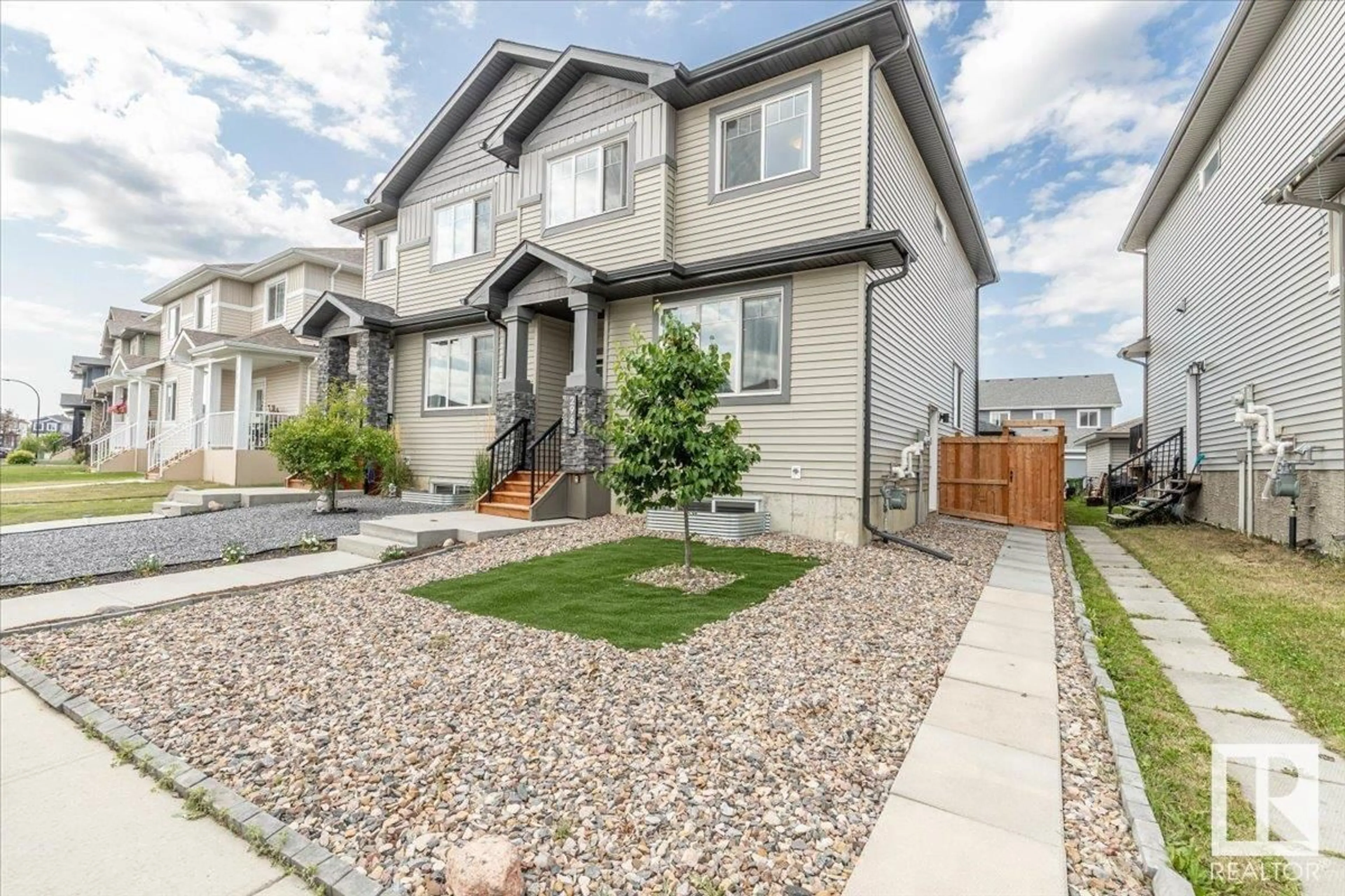 Home with vinyl exterior material, street for 296 ROLSTON WD, Leduc Alberta T9G1G5