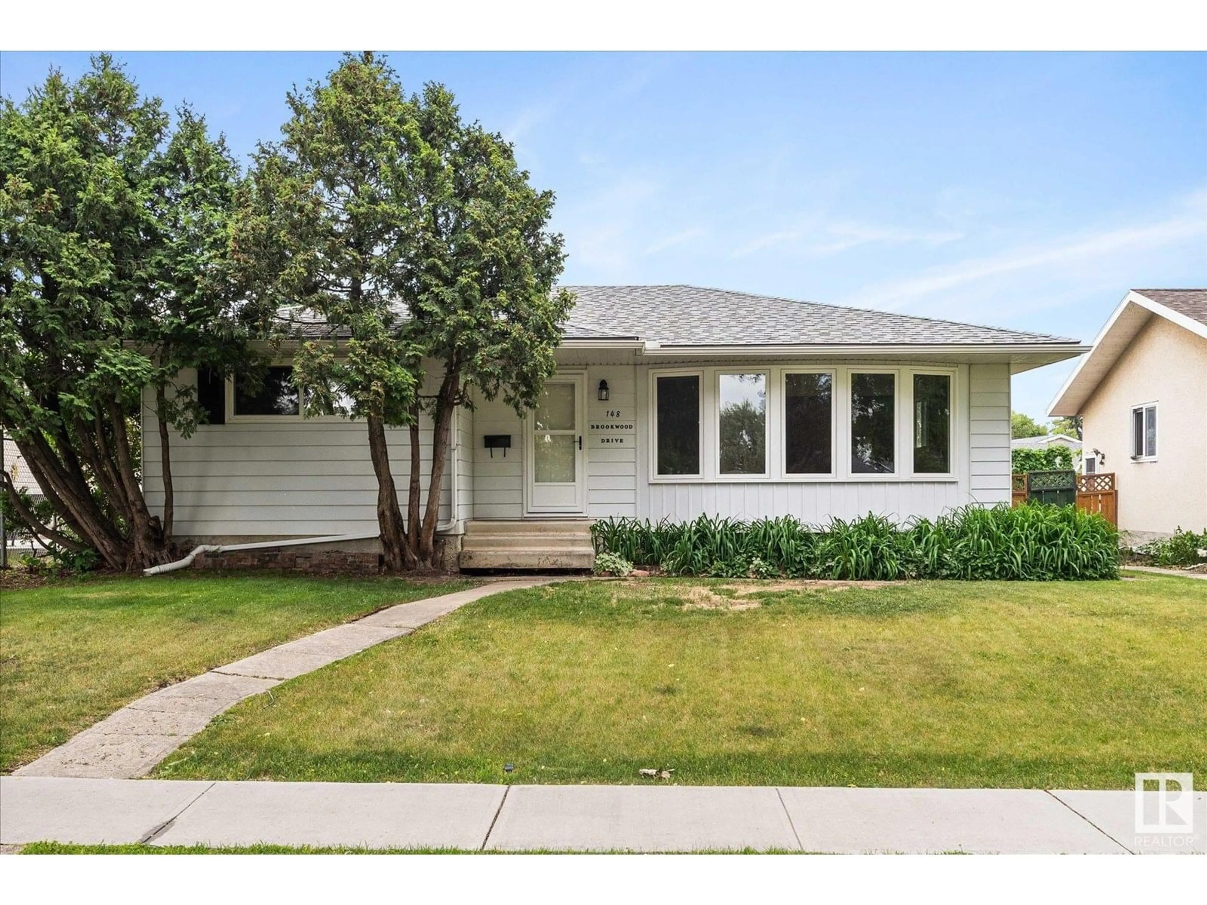 Home with vinyl exterior material, street for 148 BROOKWOOD DR, Spruce Grove Alberta T7X1G5