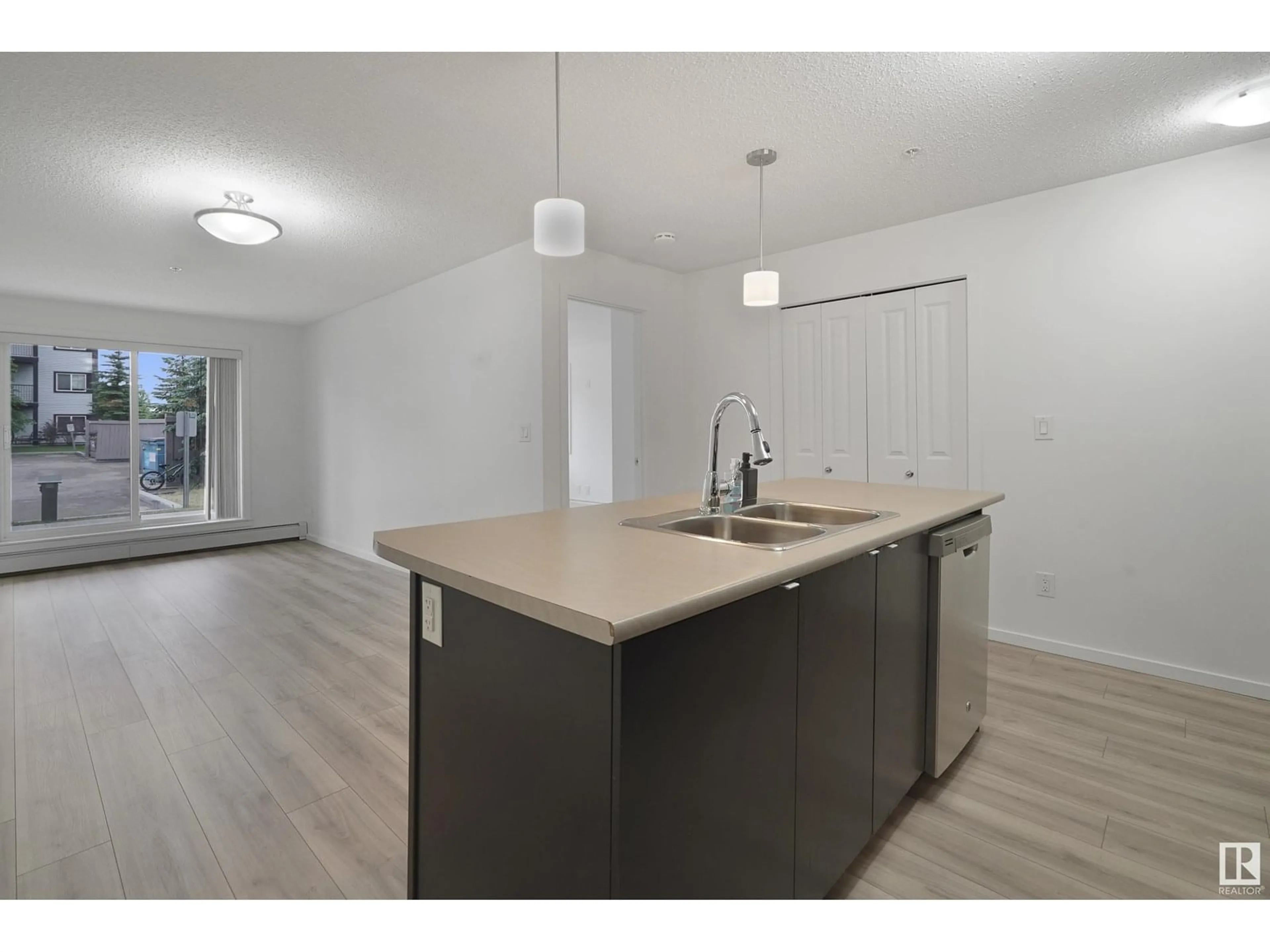 Open concept kitchen, unknown for #114 - 3357 16A AV, Edmonton Alberta T6T0V4