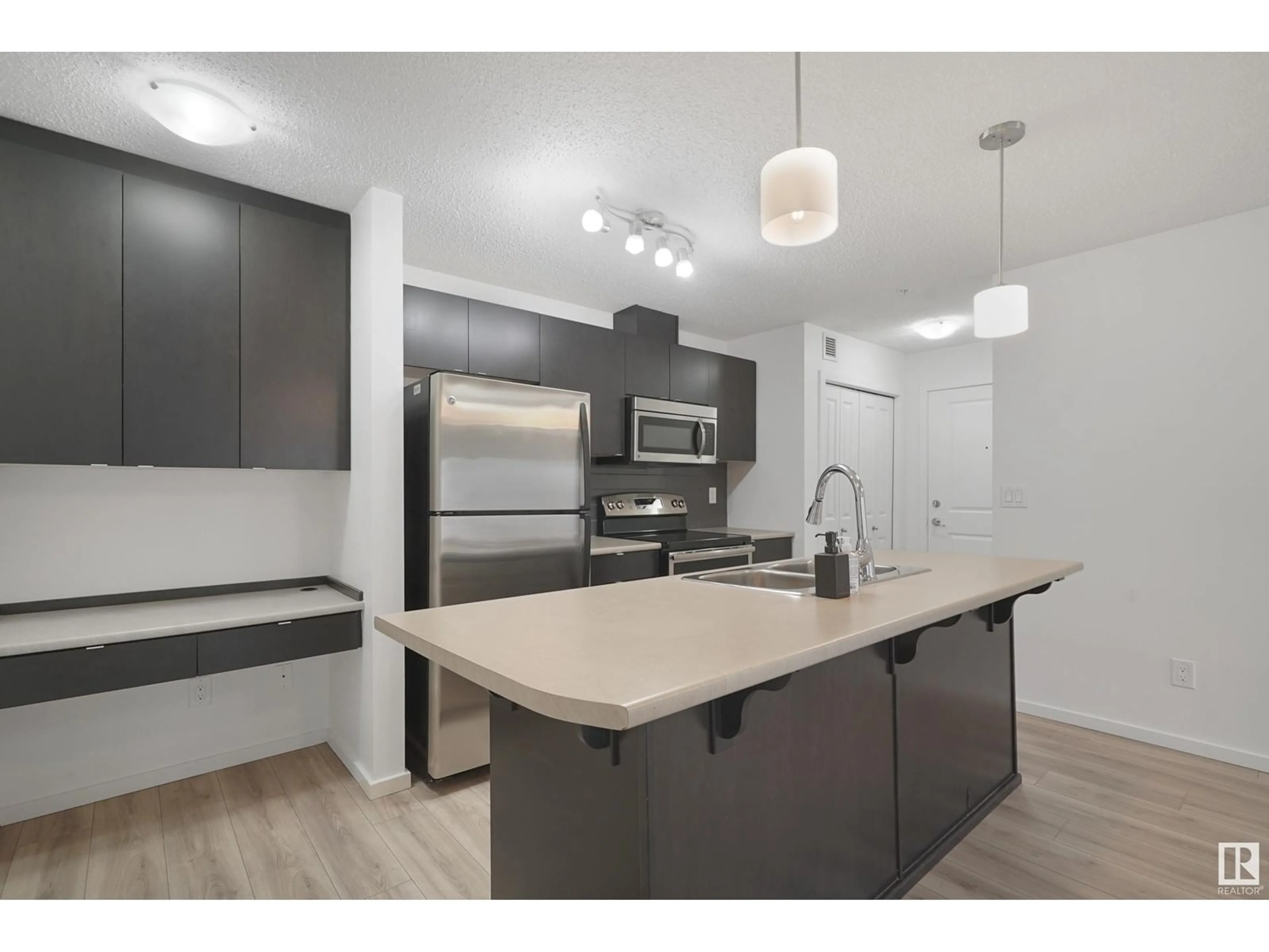 Open concept kitchen, unknown for #114 - 3357 16A AV, Edmonton Alberta T6T0V4