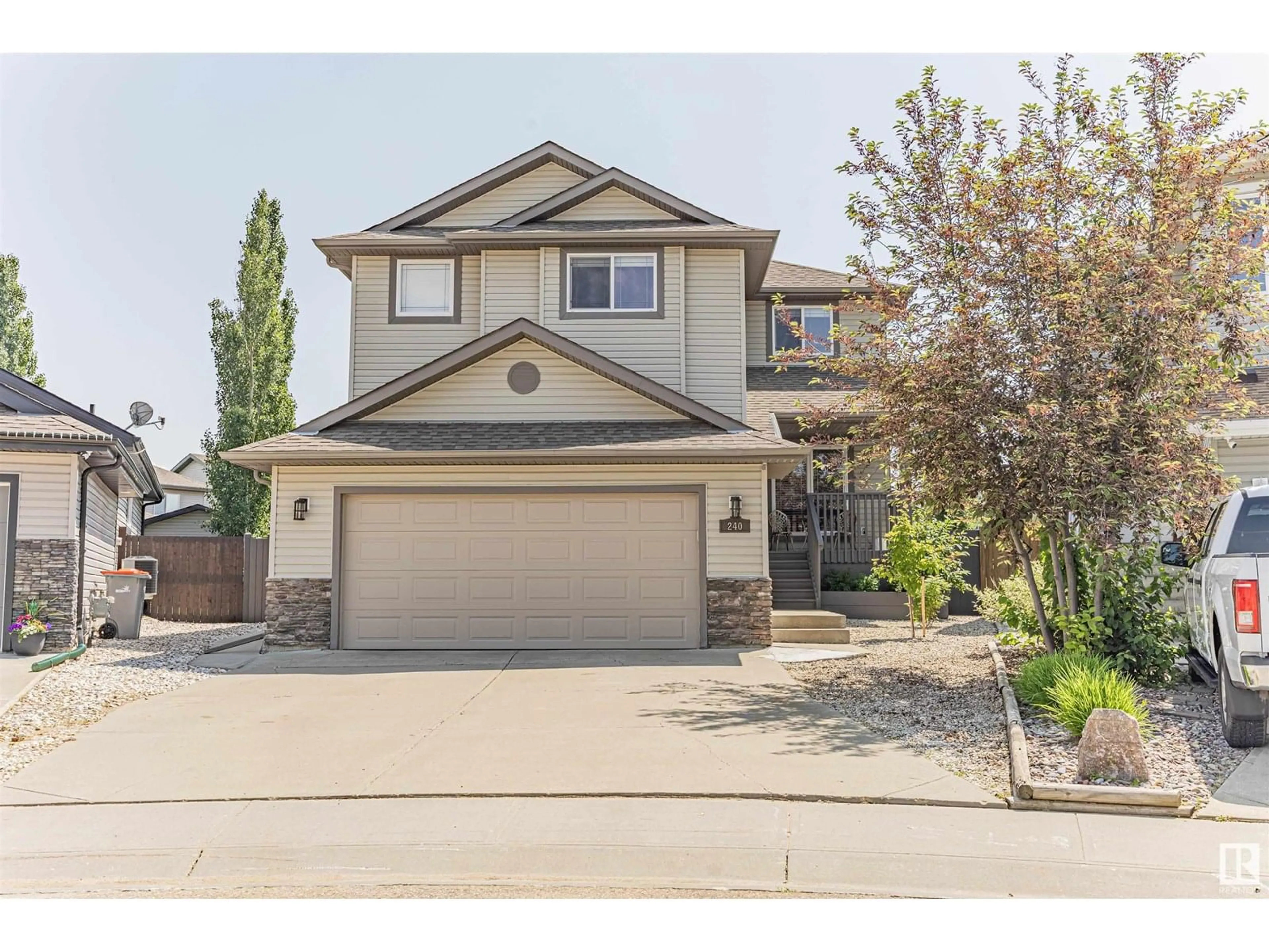 Home with vinyl exterior material, street for 240 SILVERSTONE CR, Stony Plain Alberta T7Z0E8