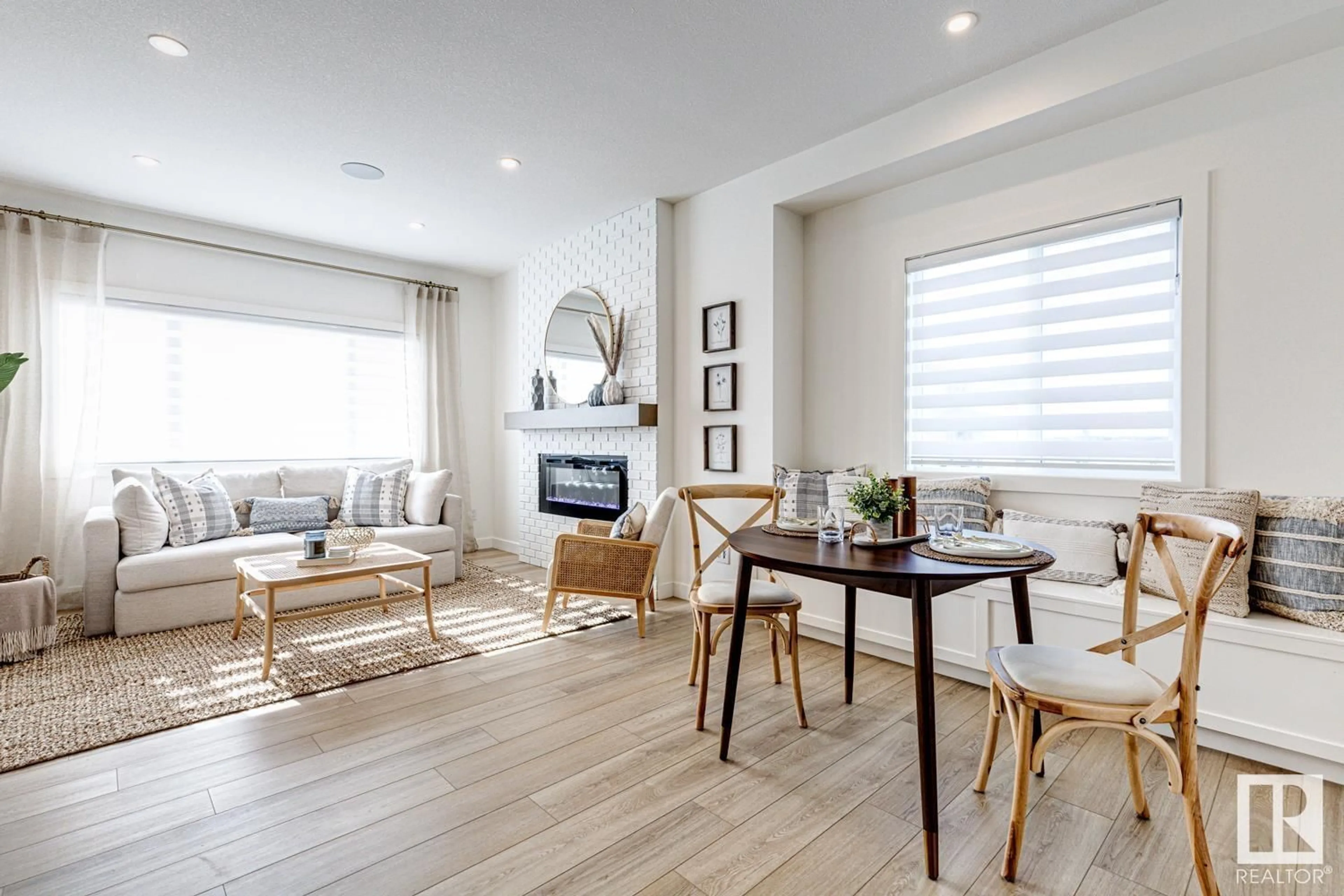 Living room with furniture, wood/laminate floor for 301 JUNIPER CV, Leduc Alberta T9E1S7