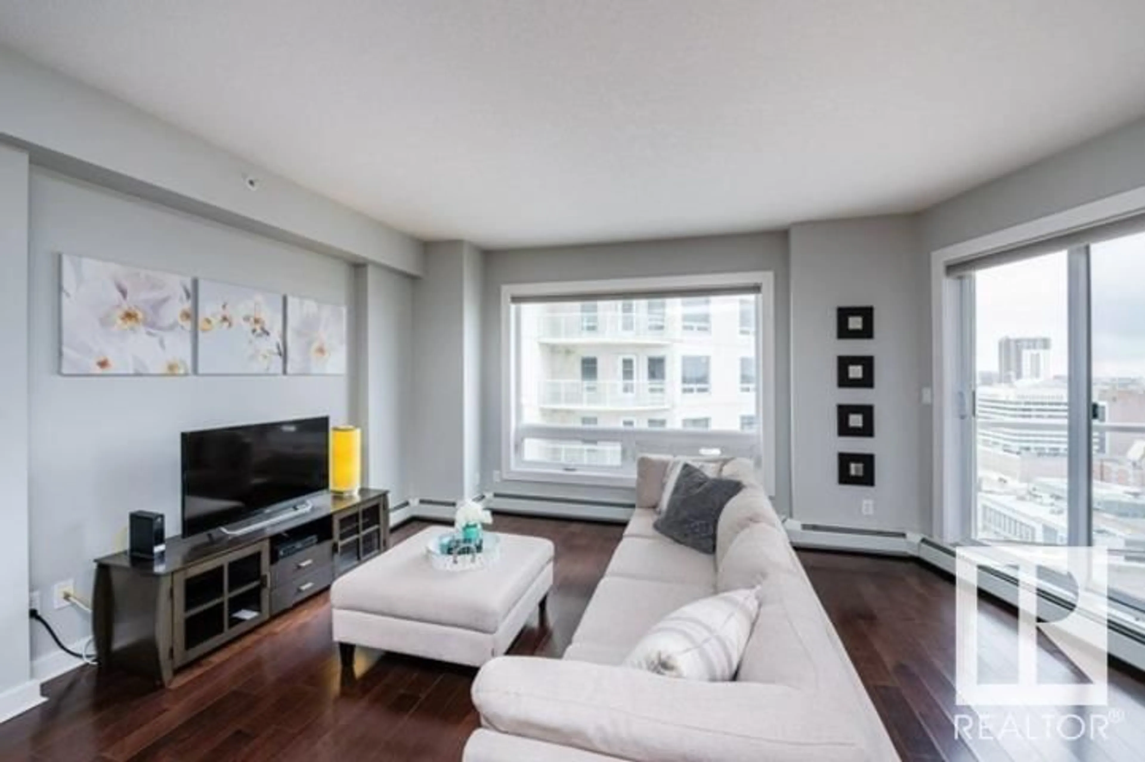 Living room with furniture, unknown for 10152 - 1705 104 ST NW, Edmonton Alberta T5J0B6