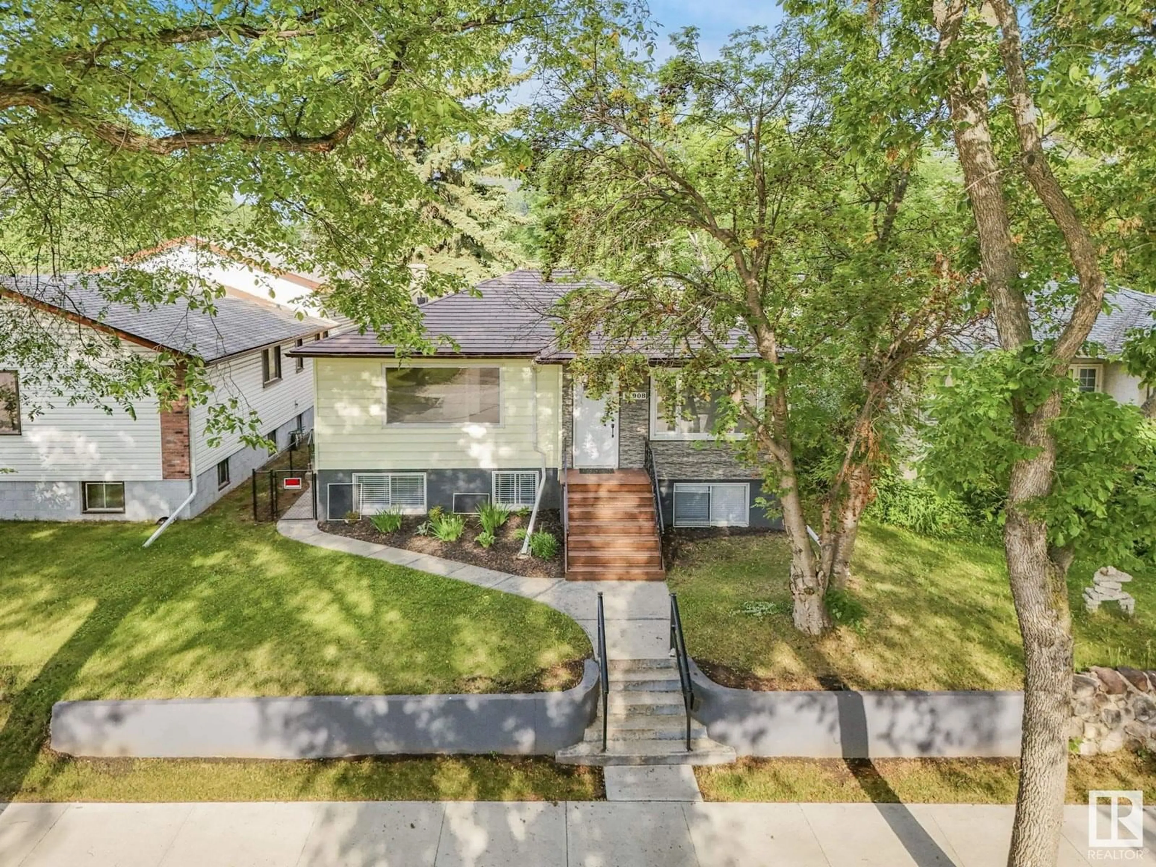 A pic from outside/outdoor area/front of a property/back of a property/a pic from drone, street for NW - 11908 52 ST, Edmonton Alberta T5W3J6