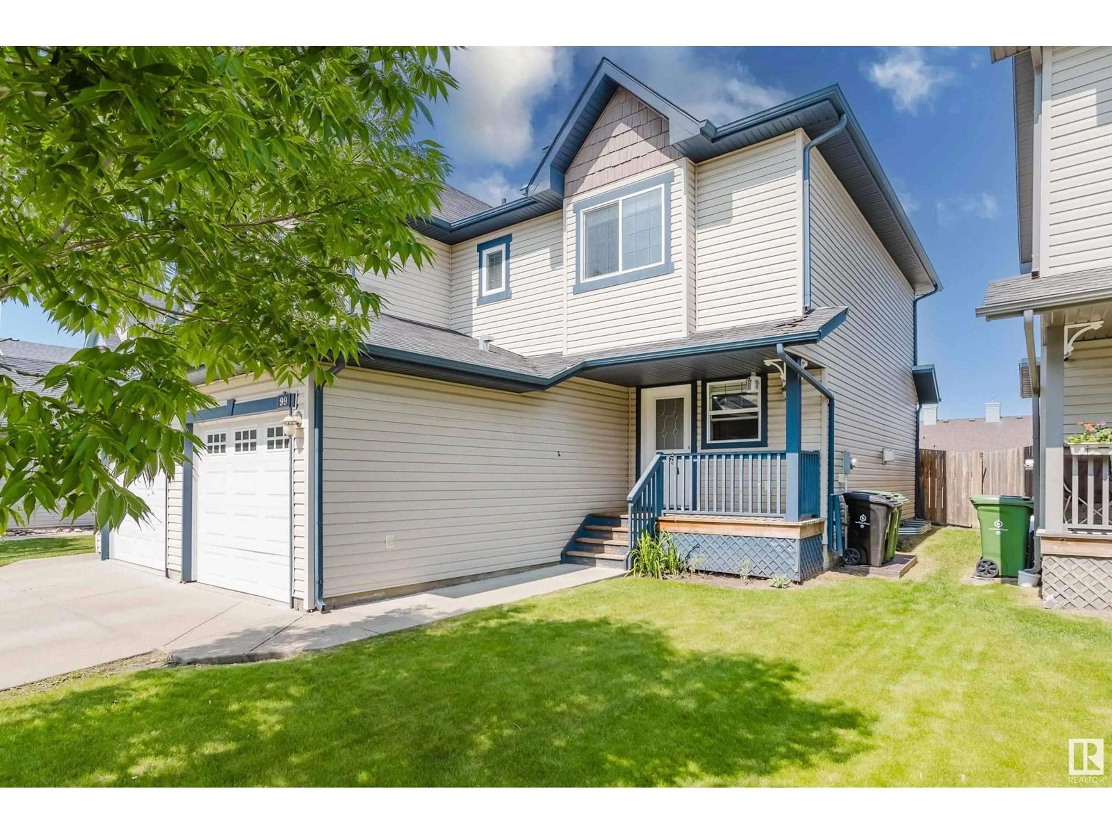 Home with vinyl exterior material, street for 99 GALLOWAY WD, Fort Saskatchewan Alberta T8L0A7