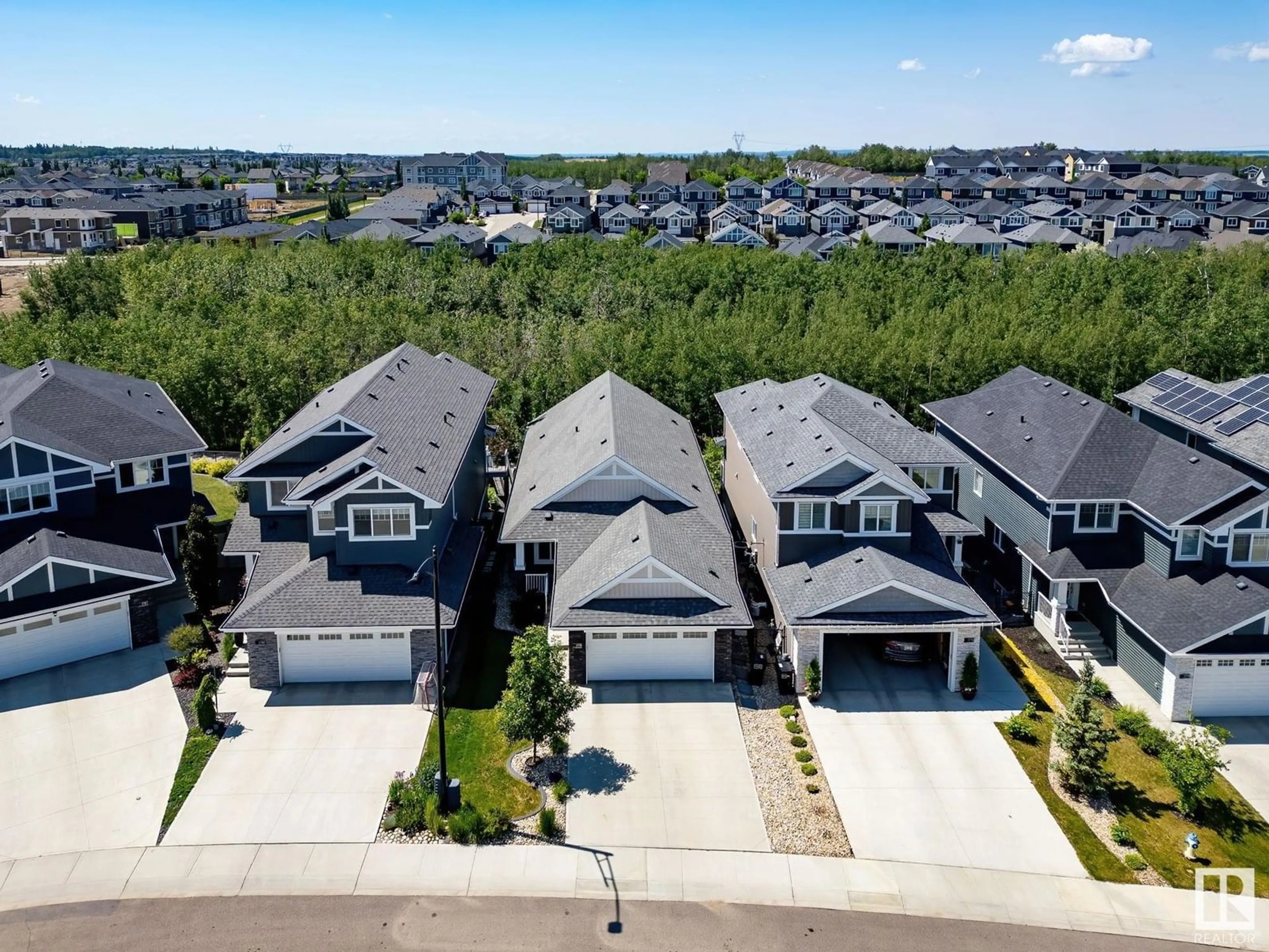 A pic from outside/outdoor area/front of a property/back of a property/a pic from drone, street for 1778 TANAGER CL, Edmonton Alberta T5S0N2