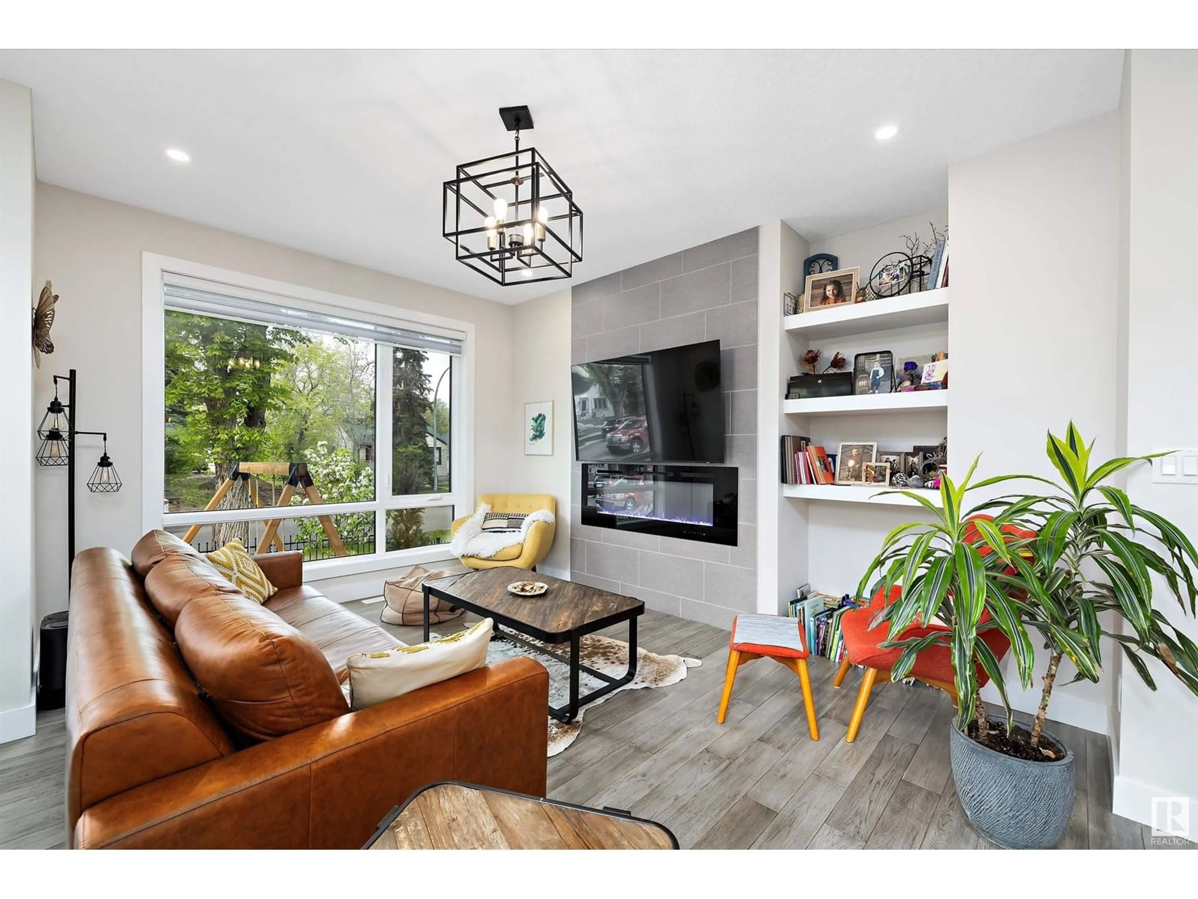 Living room with furniture, unknown for 10917 79 AV, Edmonton Alberta T6G0P1