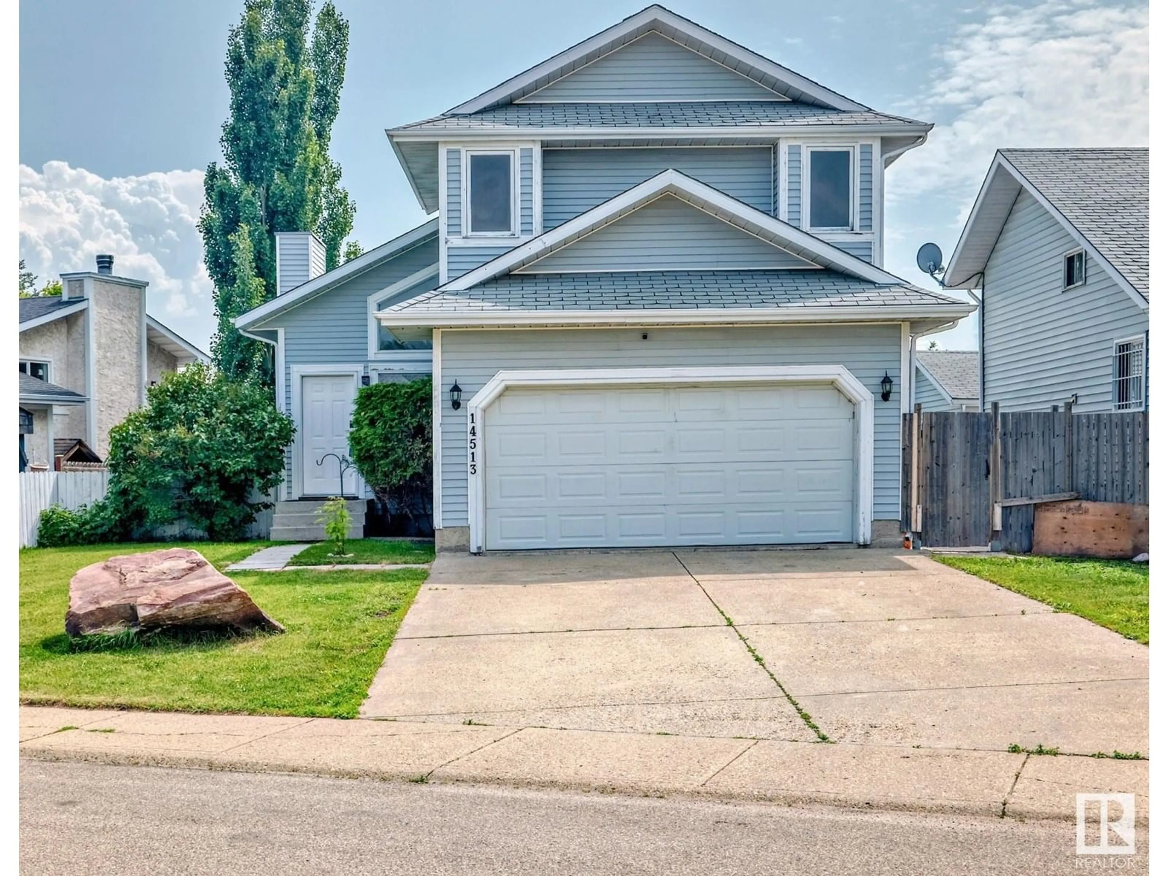 Home with vinyl exterior material, street for NW - 14513 37 ST, Edmonton Alberta T5Y2K8