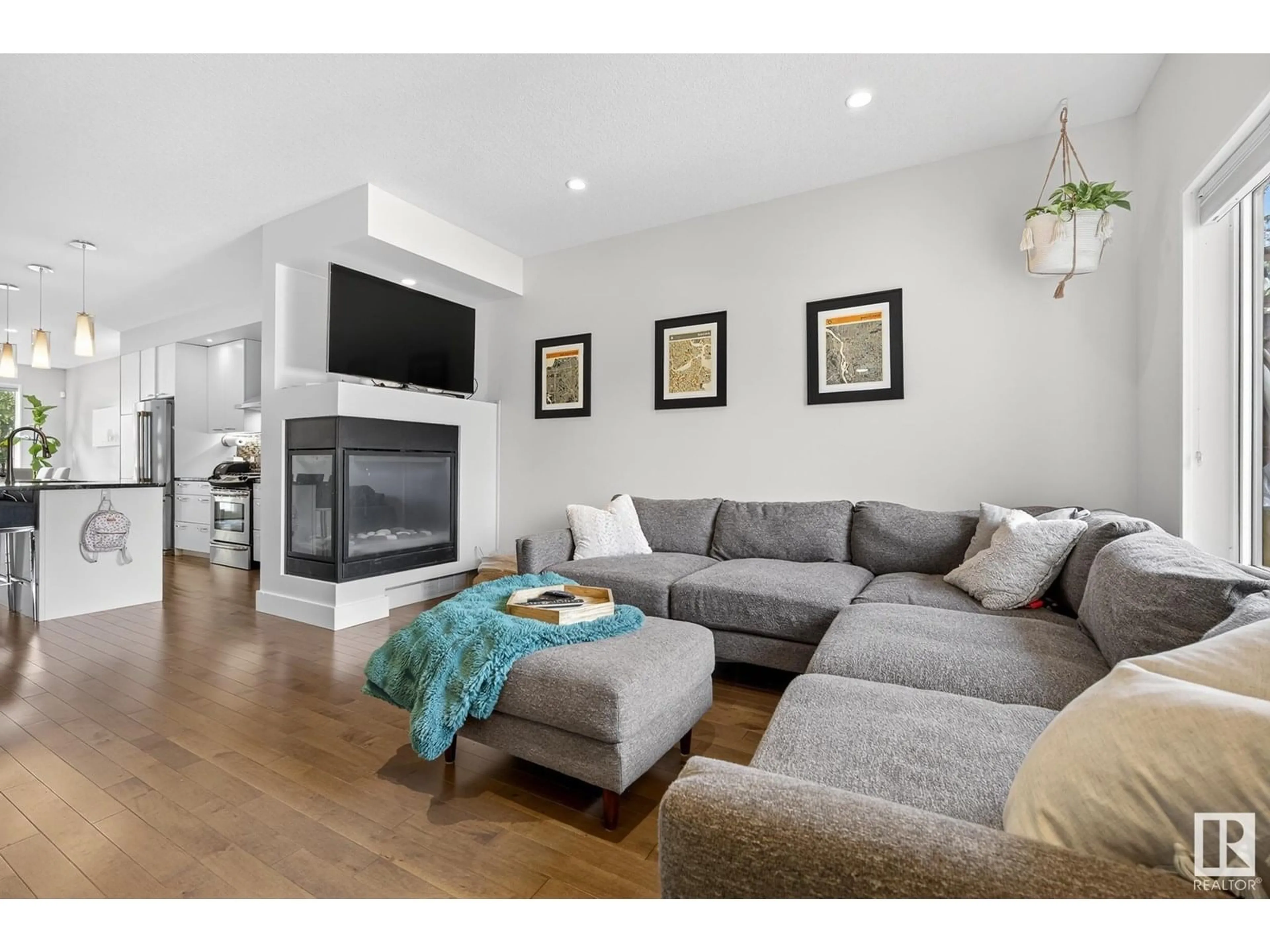Living room with furniture, wood/laminate floor for NW - 10462 144 ST, Edmonton Alberta T5N2V4