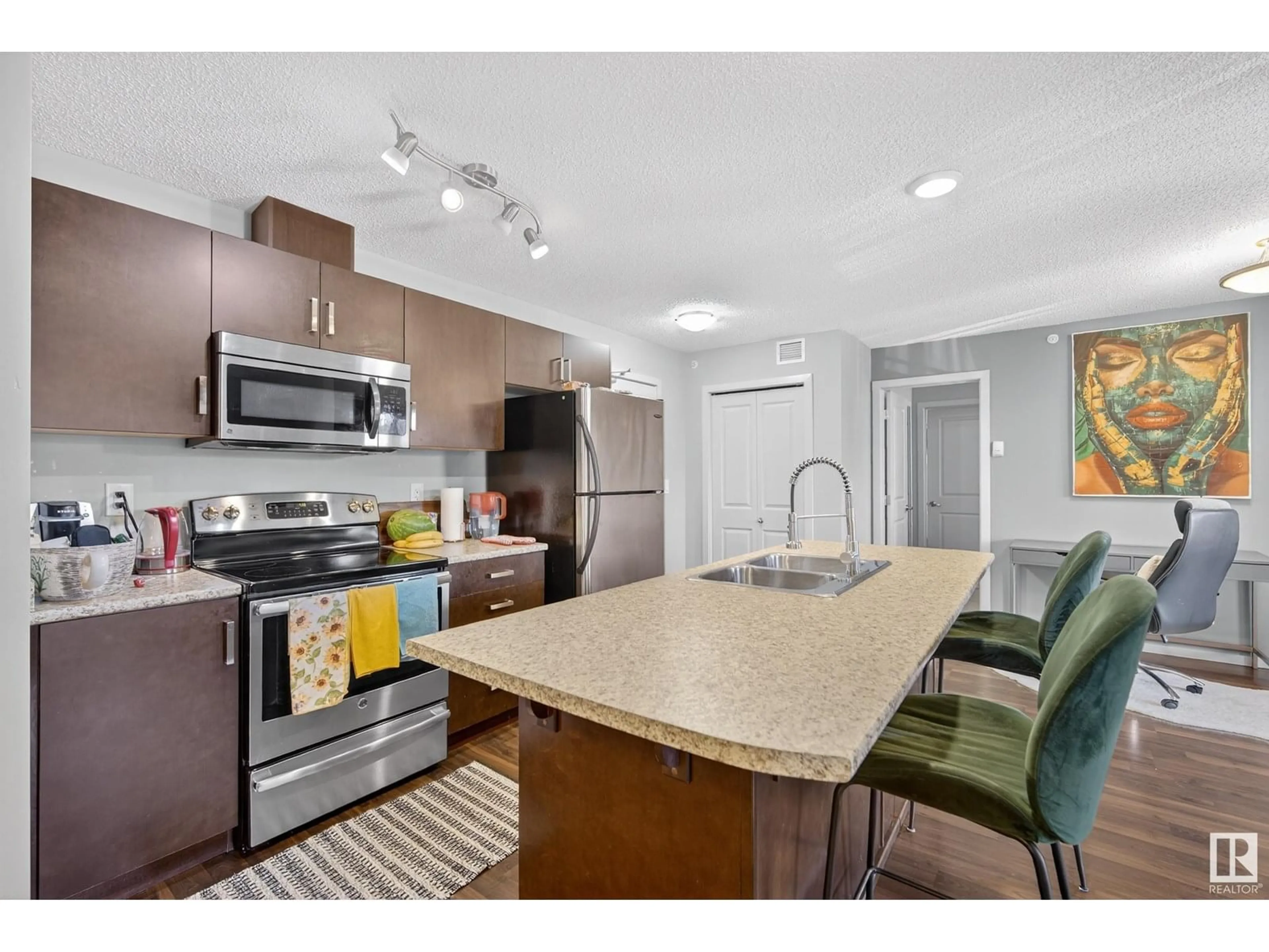 Open concept kitchen, unknown for 407 - 5521 7 AV SW, Edmonton Alberta T6X2A8